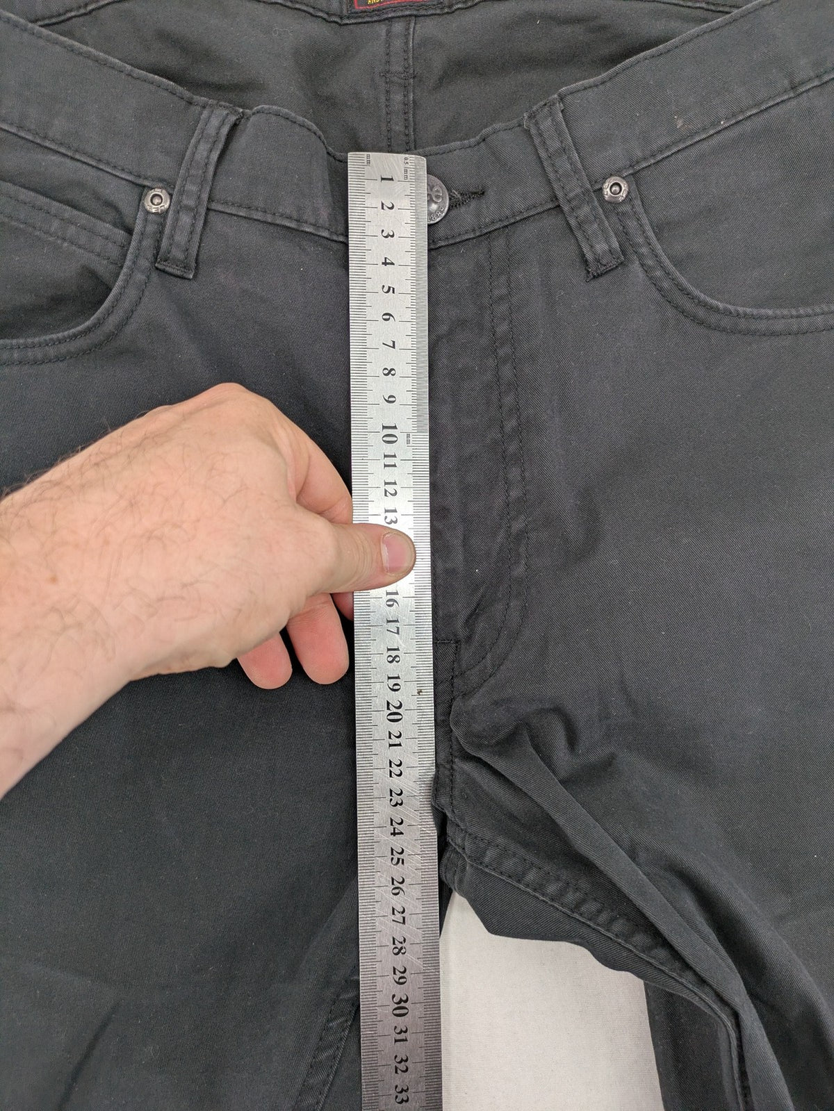 Lee straight jeans grey classic 5-pocket design with zip fly and subtle branding.