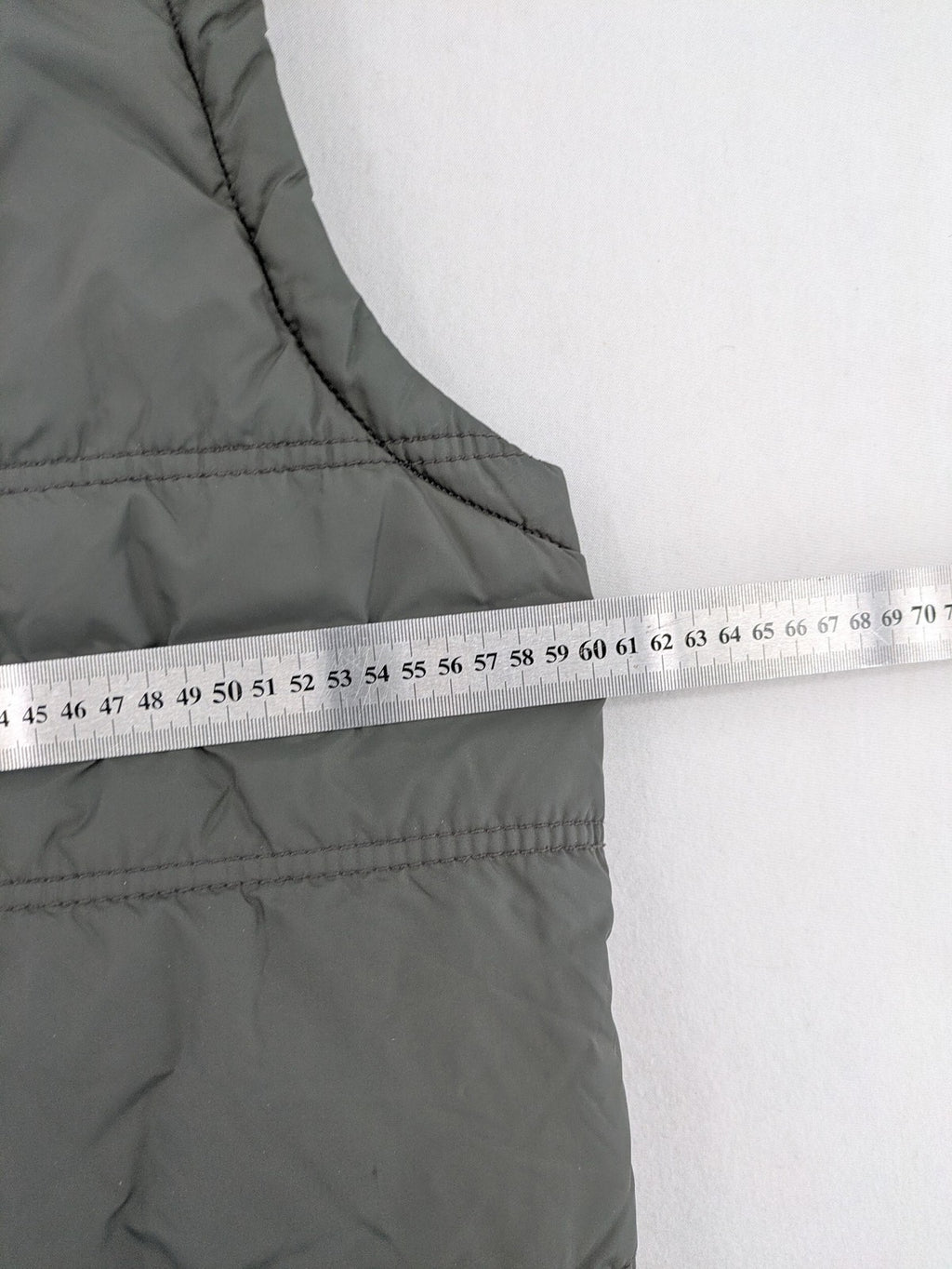 Camargue grey quilted jacket with fleece collar and buttoned pockets.
