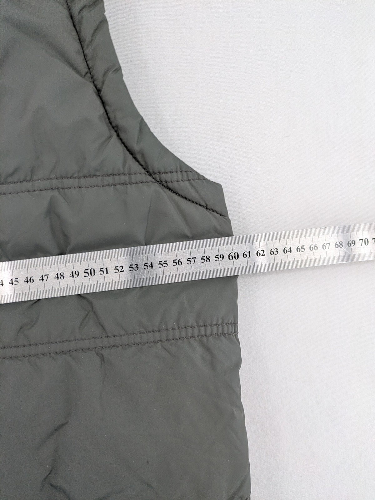 Camargue grey quilted jacket with fleece collar and buttoned pockets.