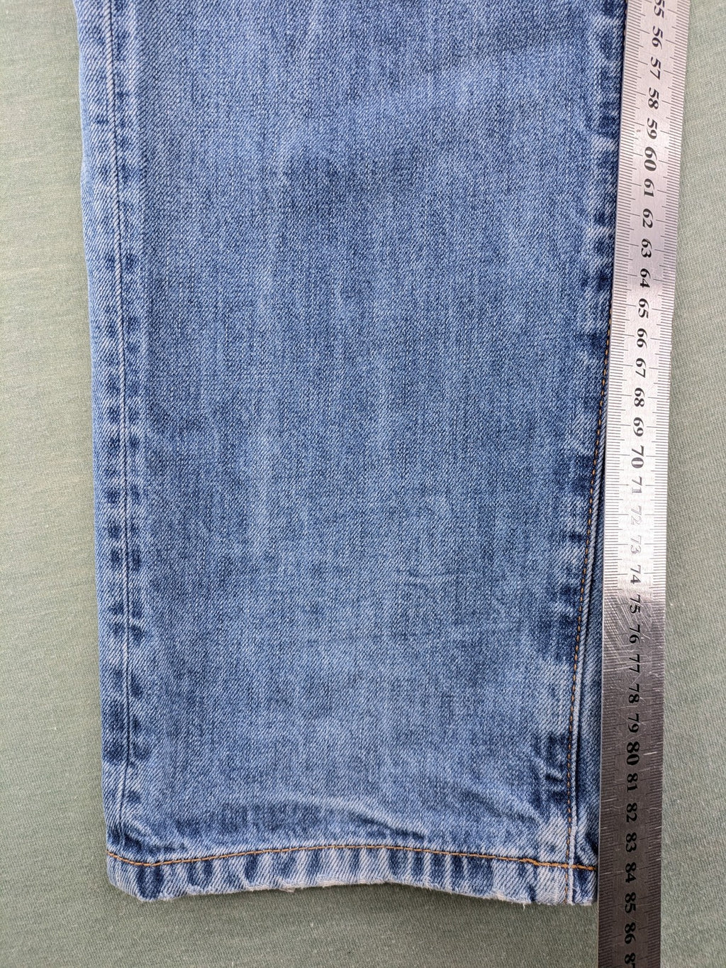 Pepe Jeans blue straight jeans with Union Jack embroidery and distressed denim finish.