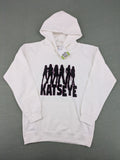 KATSEYE white zip-through hoodie with black silhouette graphic and logo, classic pullover style.