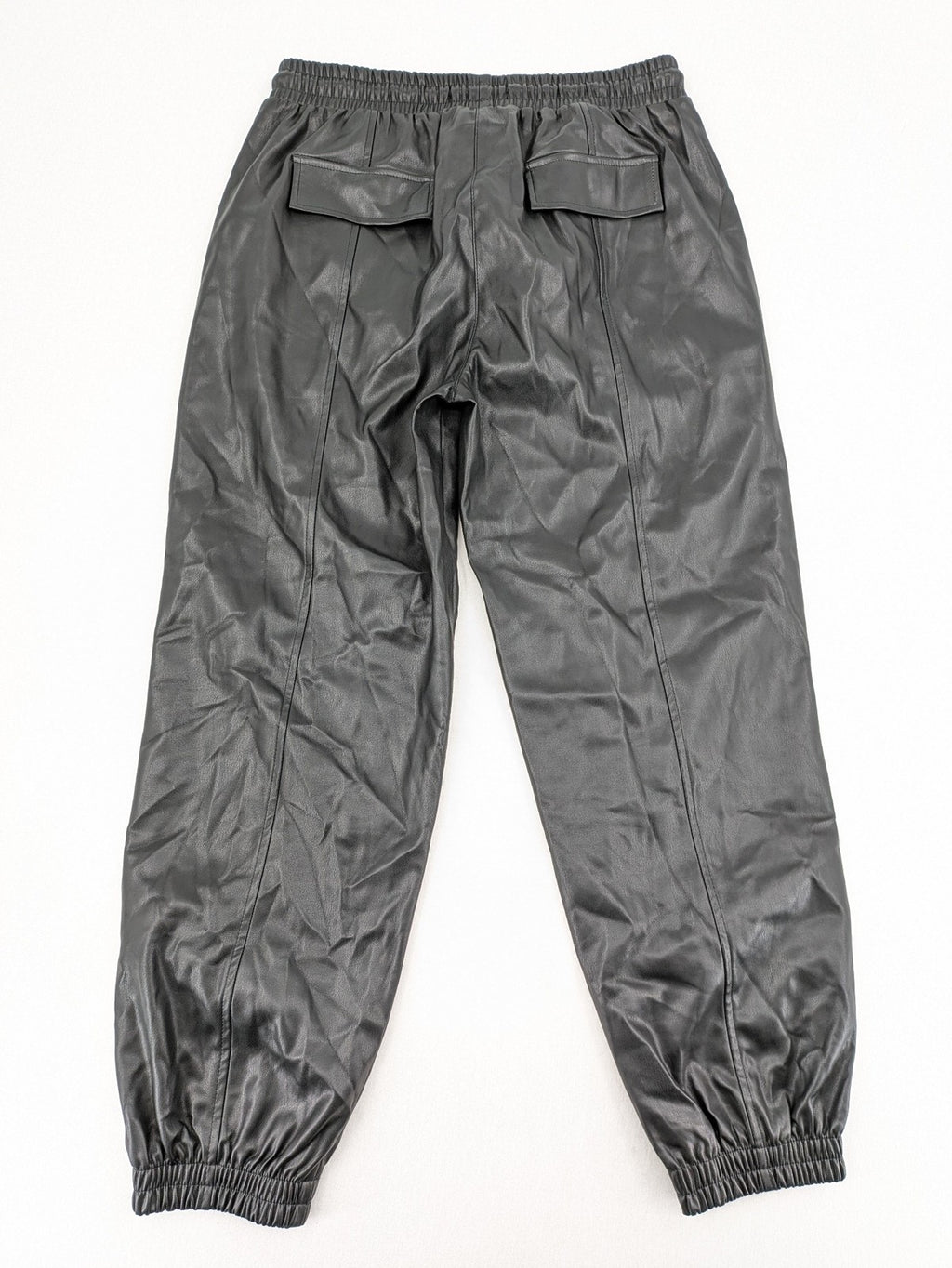 FB Sister grey jogger pants high waist with elastic waistband and drawstring, faux leather material.