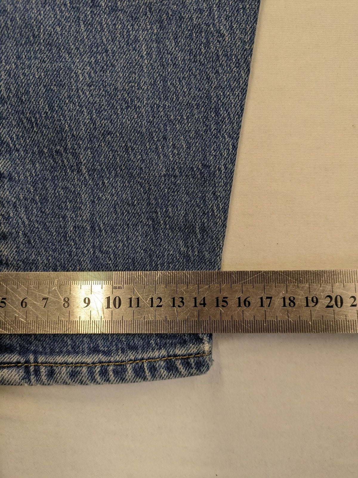 CHASIN' blue slim fit jeans with button fly and classic denim craftsmanship.