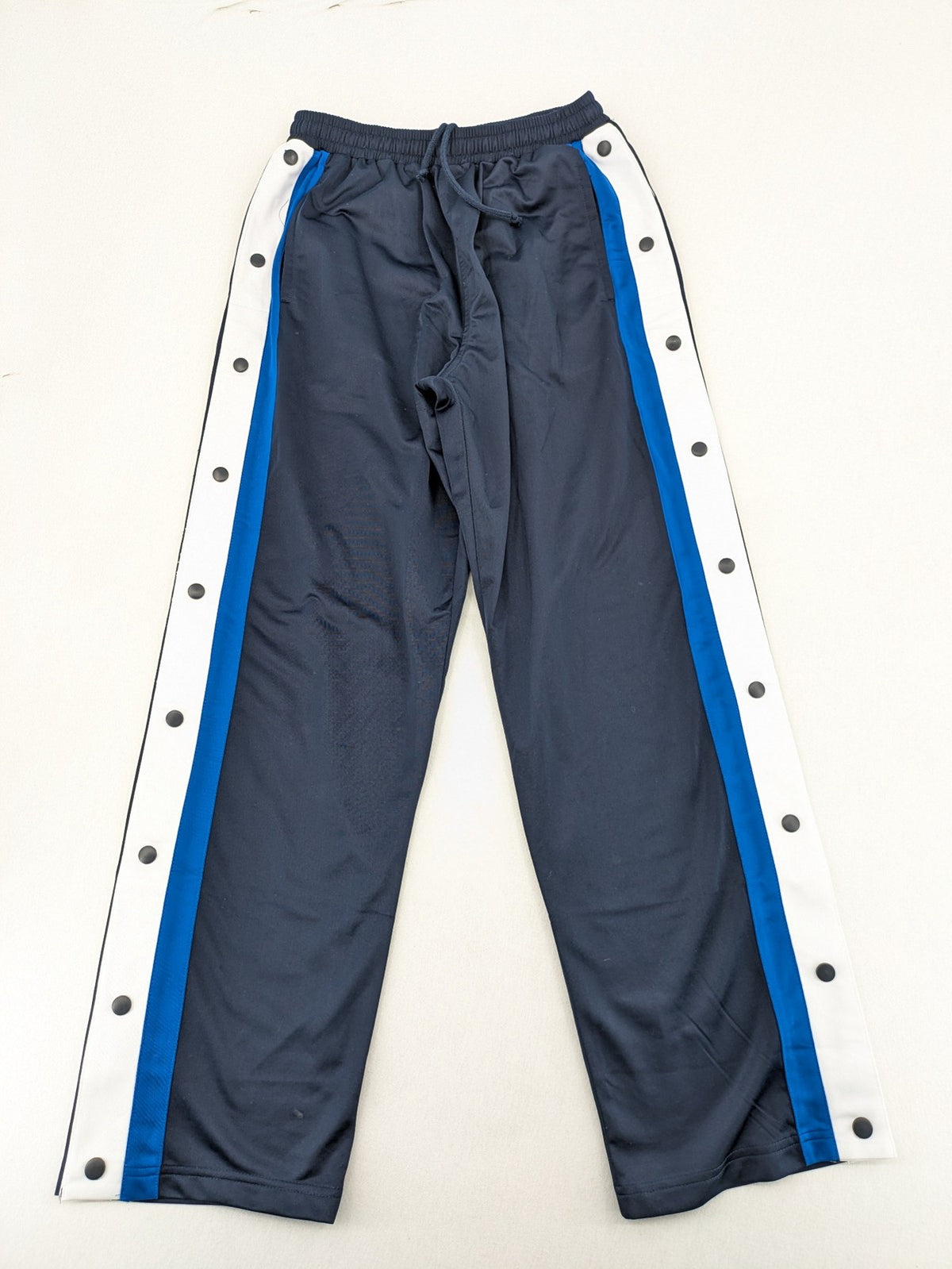 McORVIS blue tearaway training pants with side snap buttons and elastic waistband.
