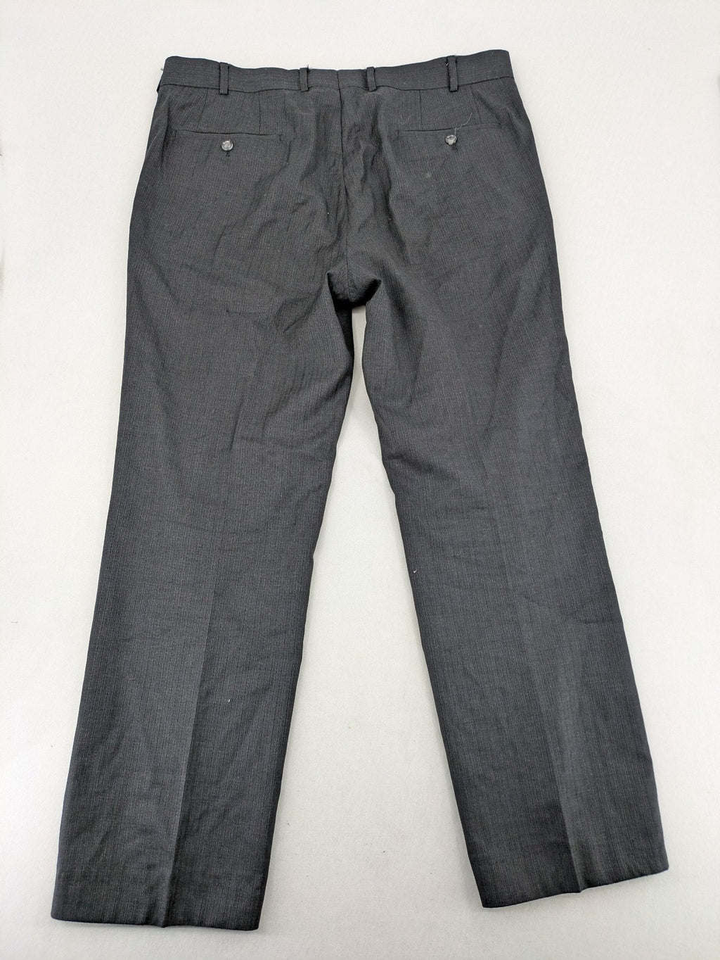 Desch grey suit pants with subtle pinstripe pattern and flat front design.