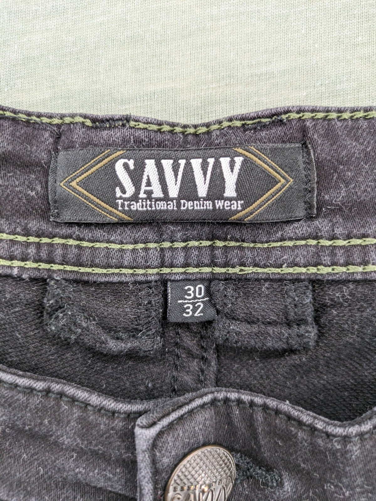 Savvy black straight jeans with washed finish and slim fit, made from stretch denim.