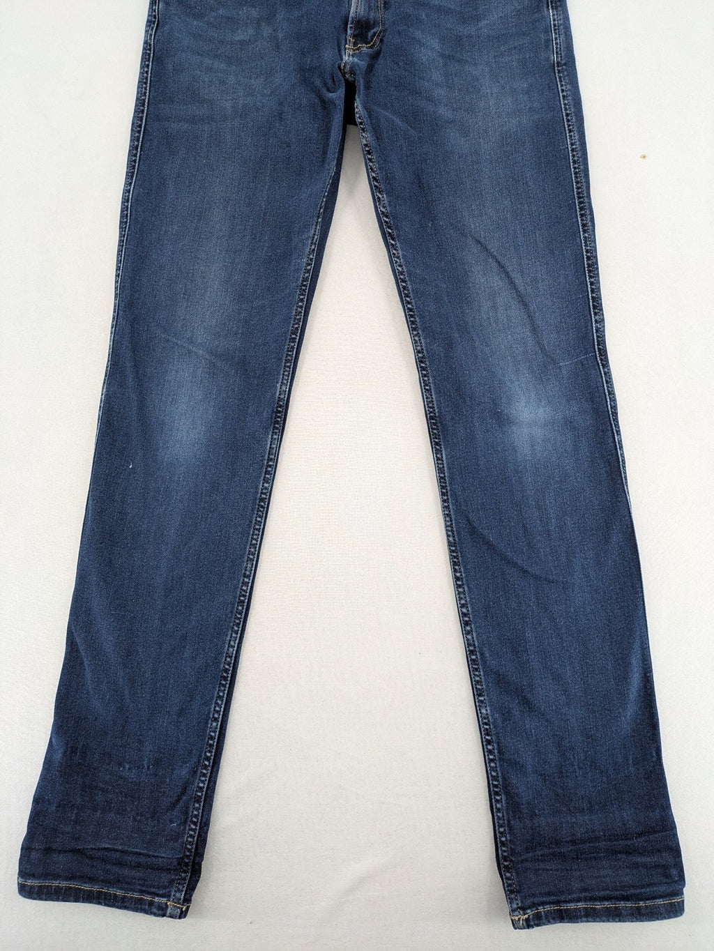Replay slim fit jeans blue with subtle fading and stretch denim material.