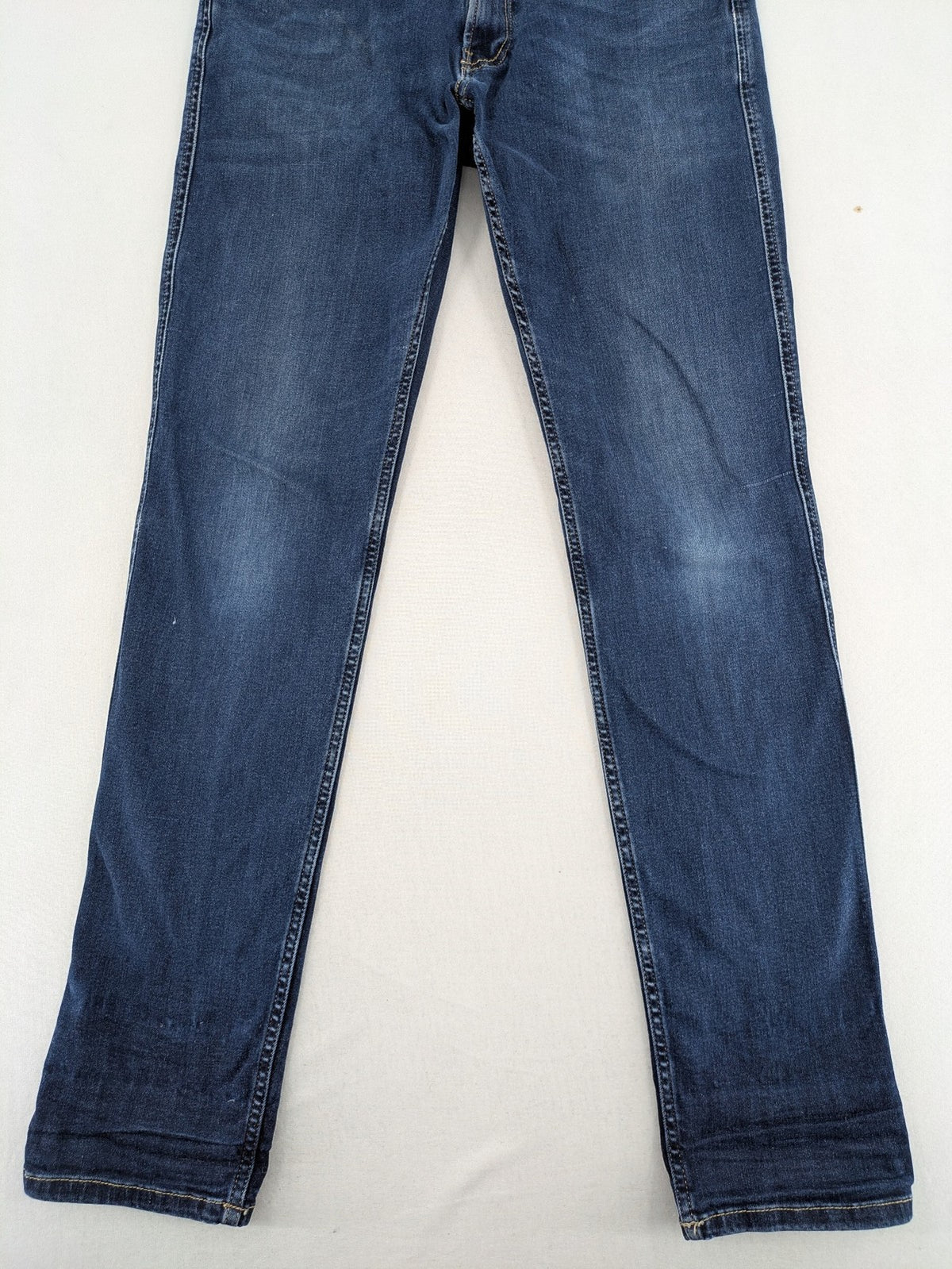 Replay slim fit jeans blue with subtle fading and stretch denim material.