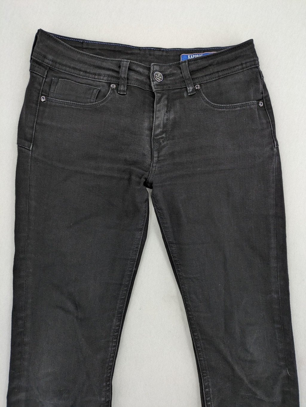 Kaporal black slim fit jeans with classic 5-pocket design and stretch denim material.