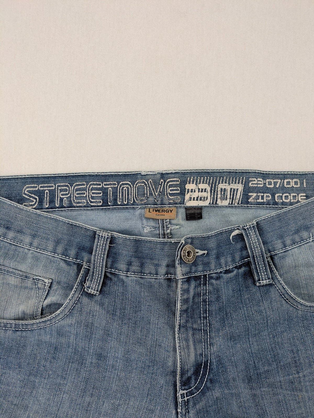 Livergy blue straight jeans with "Streetmove" logo, classic 5-pocket style, cotton-polyester blend.