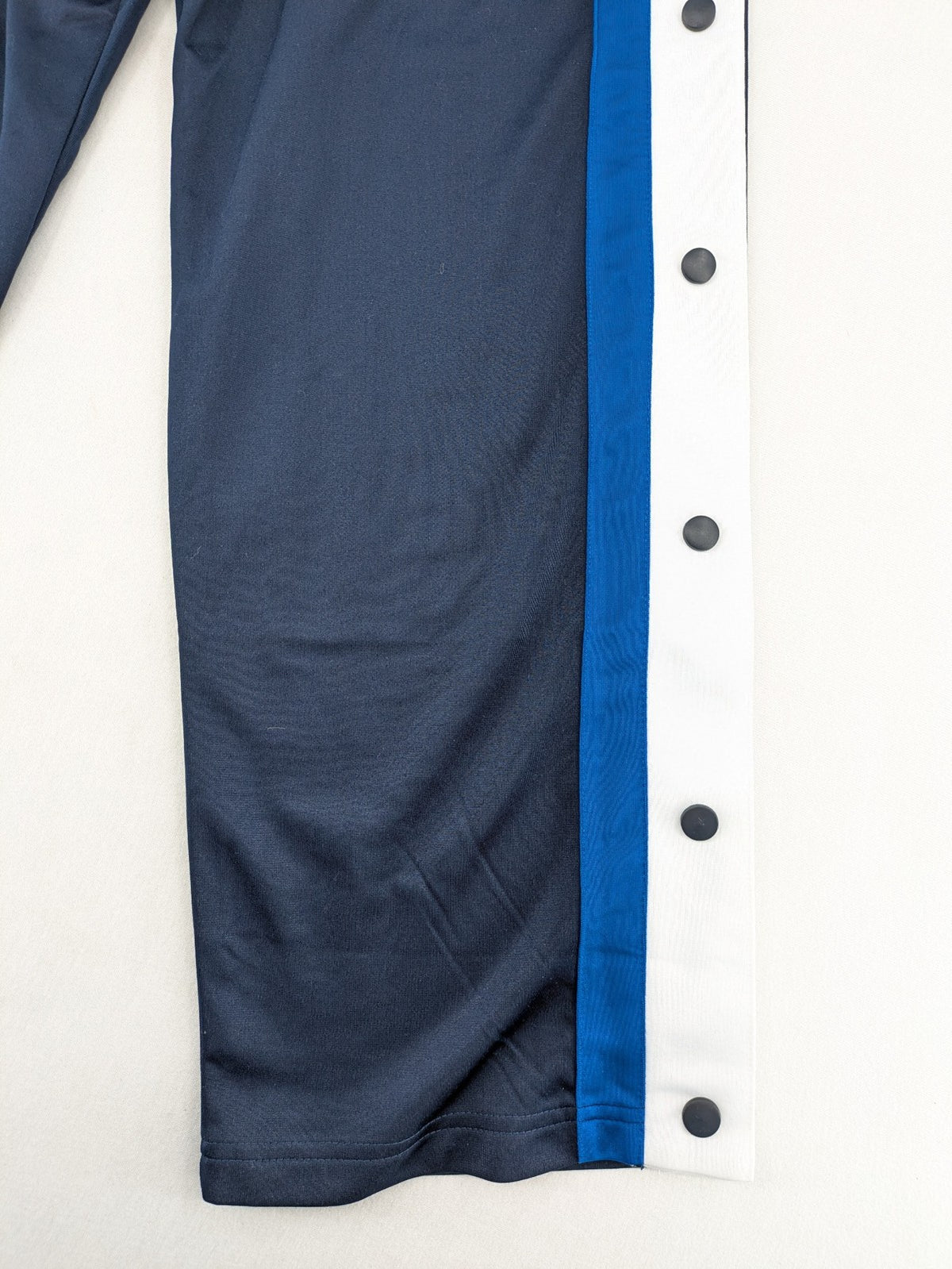 McORVIS blue tearaway training pants with side snap buttons and elastic waistband.