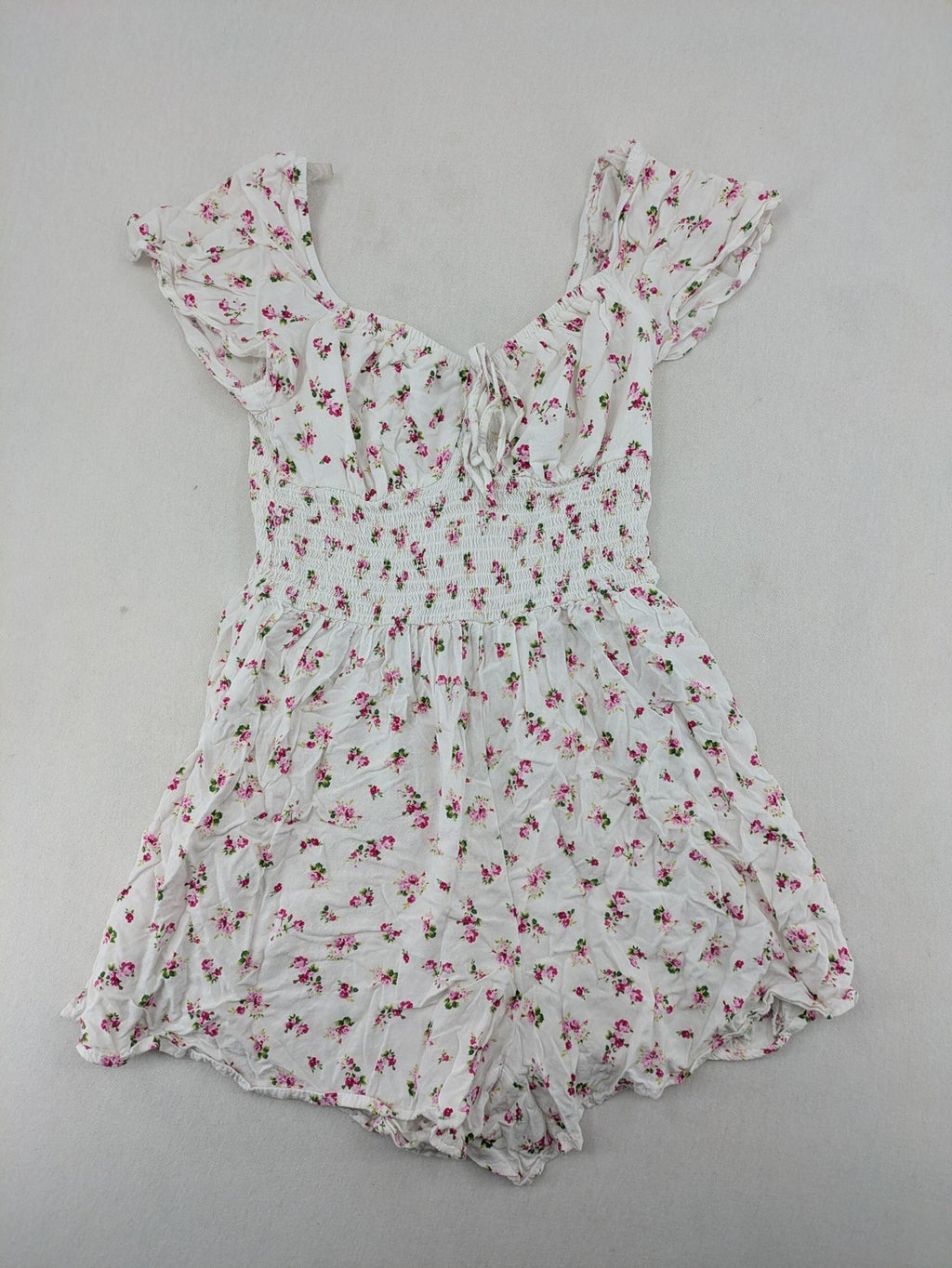 FB Sister floral playsuit white with pink flowers, smocked bodice, lightweight viscose material.