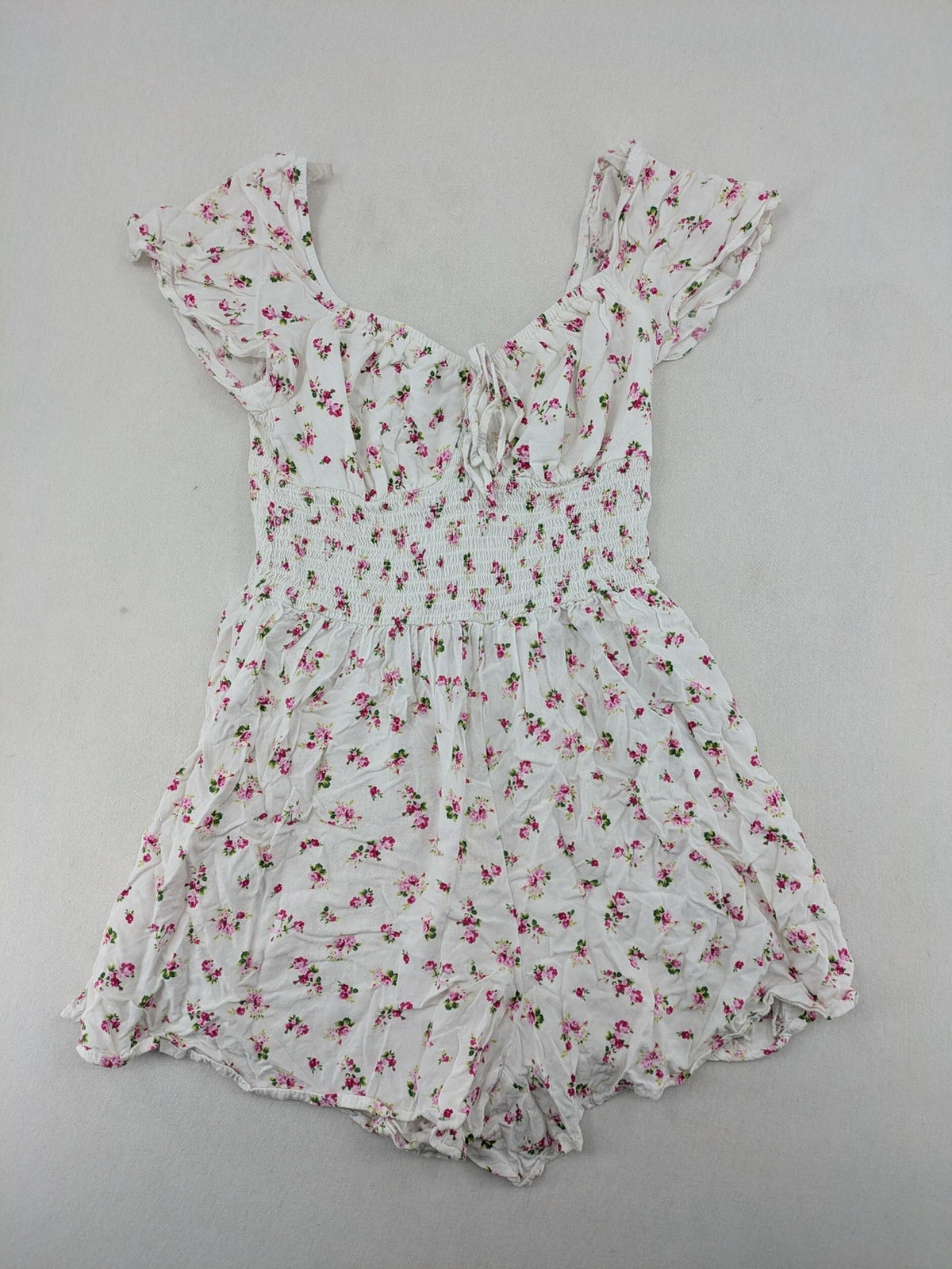 FB Sister floral playsuit white with pink flowers, smocked bodice, lightweight viscose material.