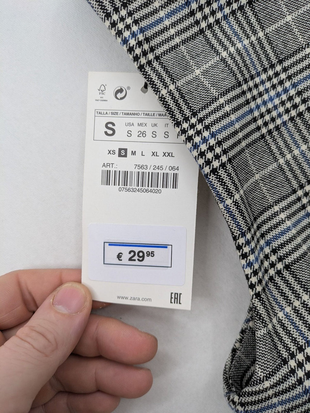 Zara ruffled sleeveless blouse grey check pattern high ruffle collar with blue, black, white accents