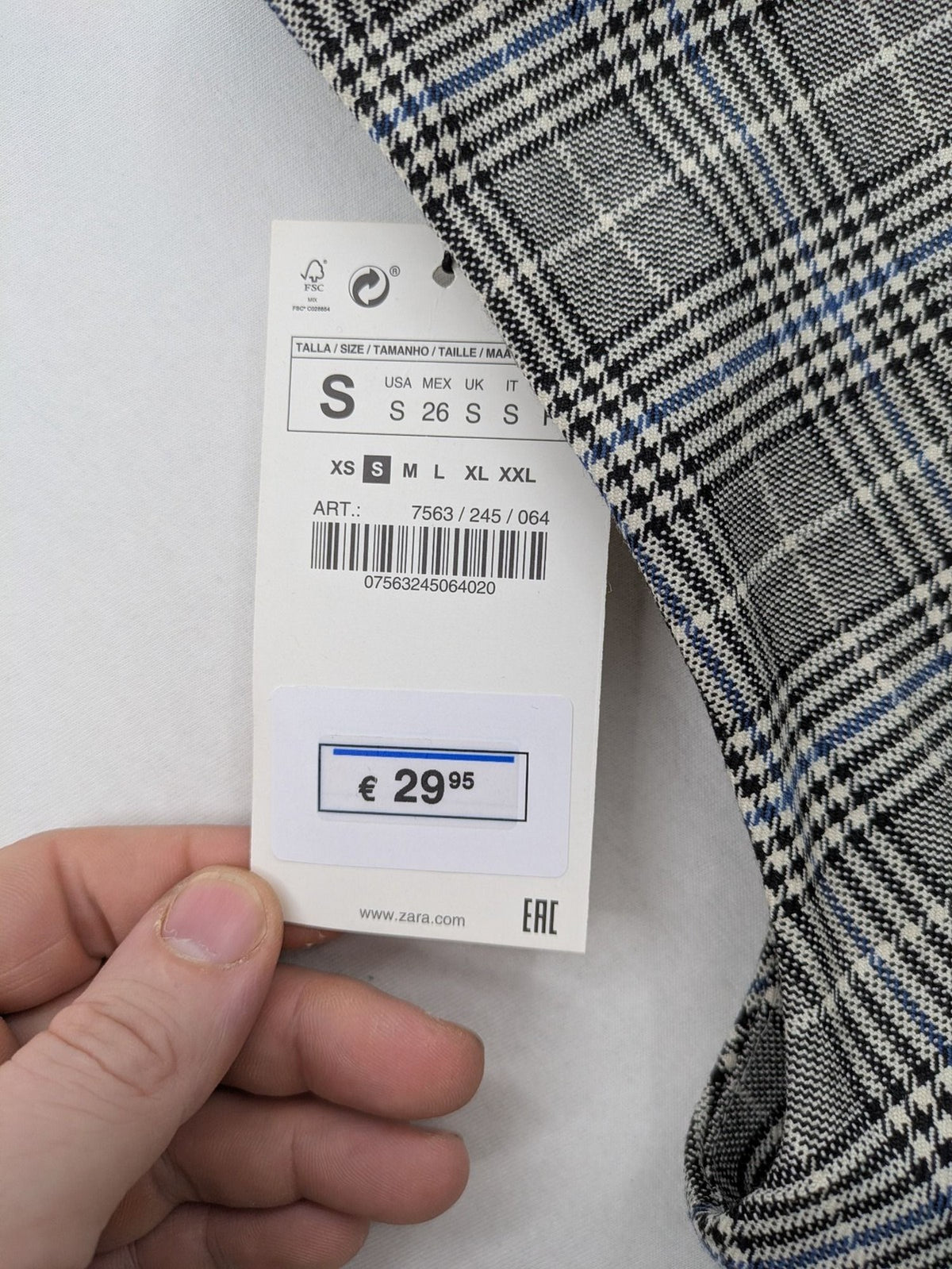 Zara ruffled sleeveless blouse grey check pattern high ruffle collar with blue, black, white accents
