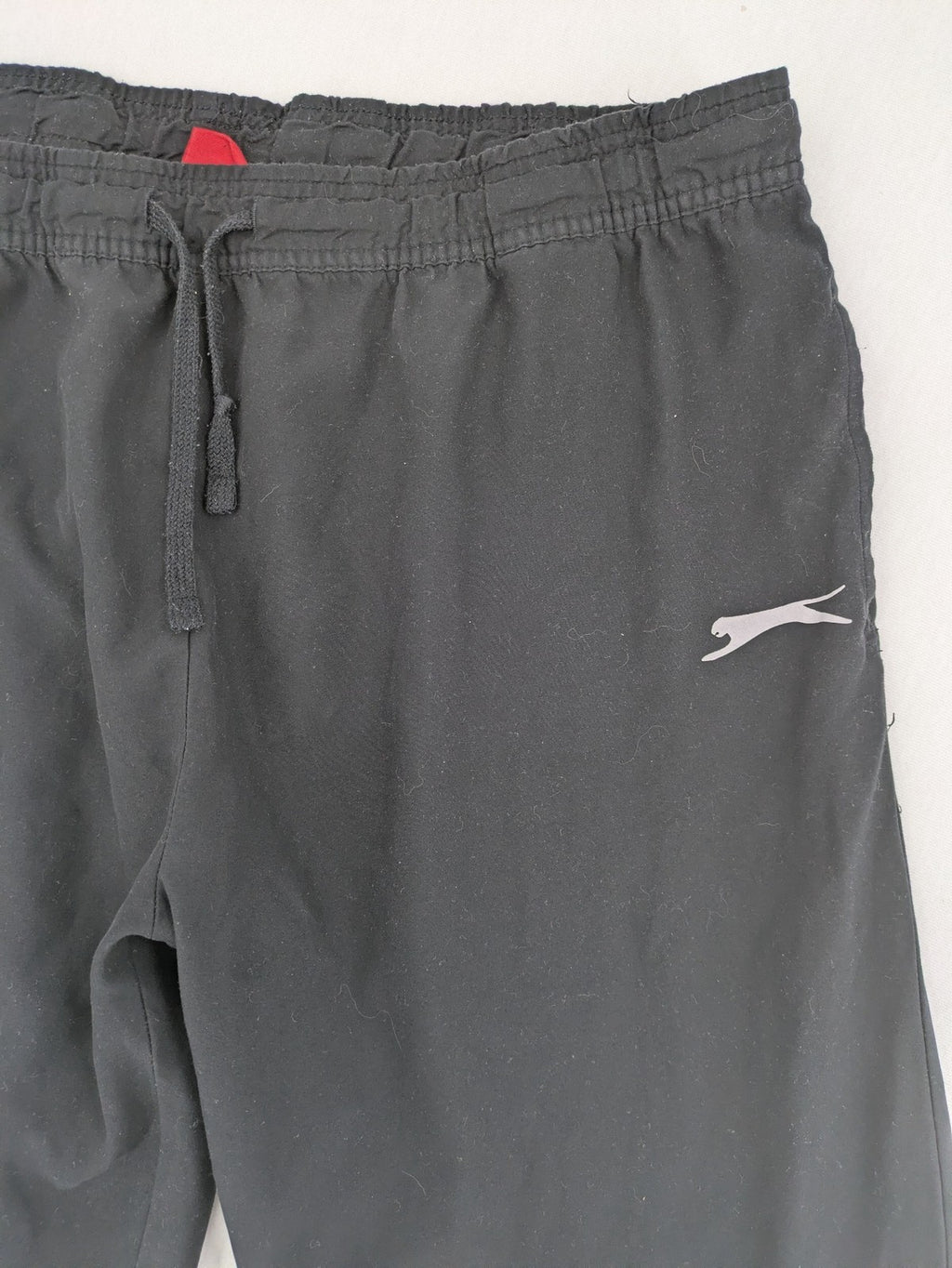 Slazenger grey loungewear joggers with adjustable drawstring and subtle logo on thigh.
