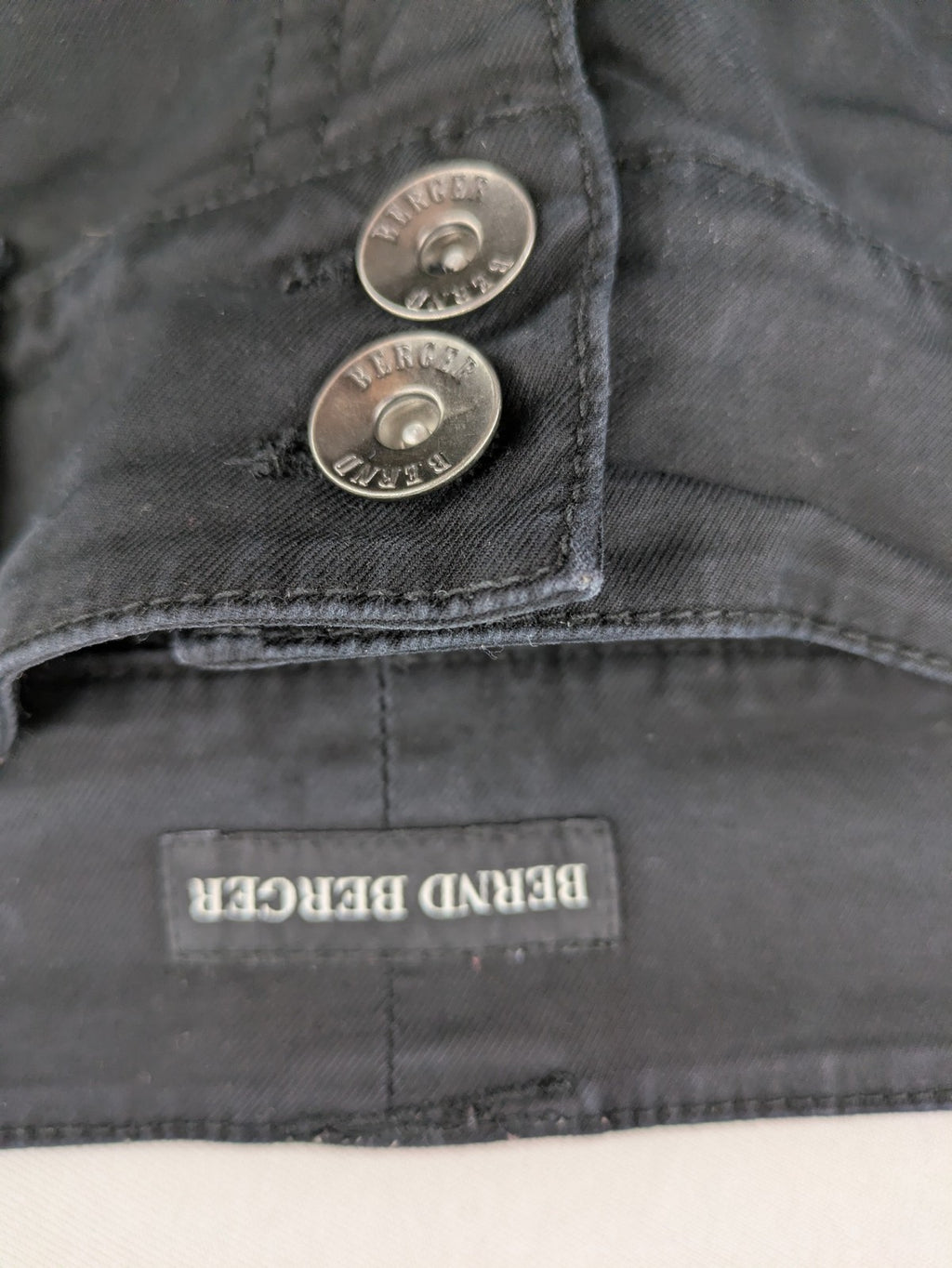 Bernd Berger grey chino pants with double button closure and straight leg design.