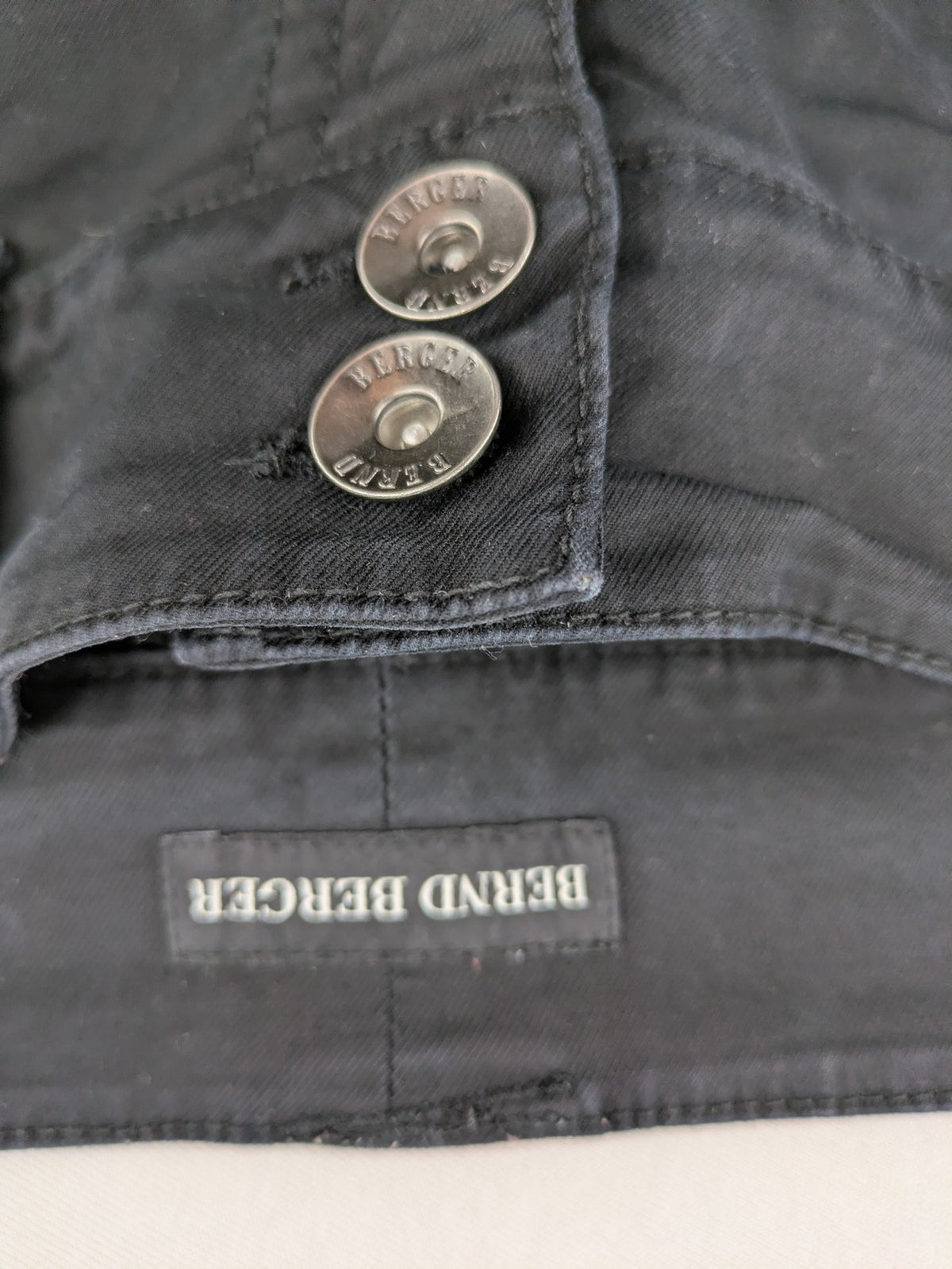 Bernd Berger grey chino pants with double button closure and straight leg design.