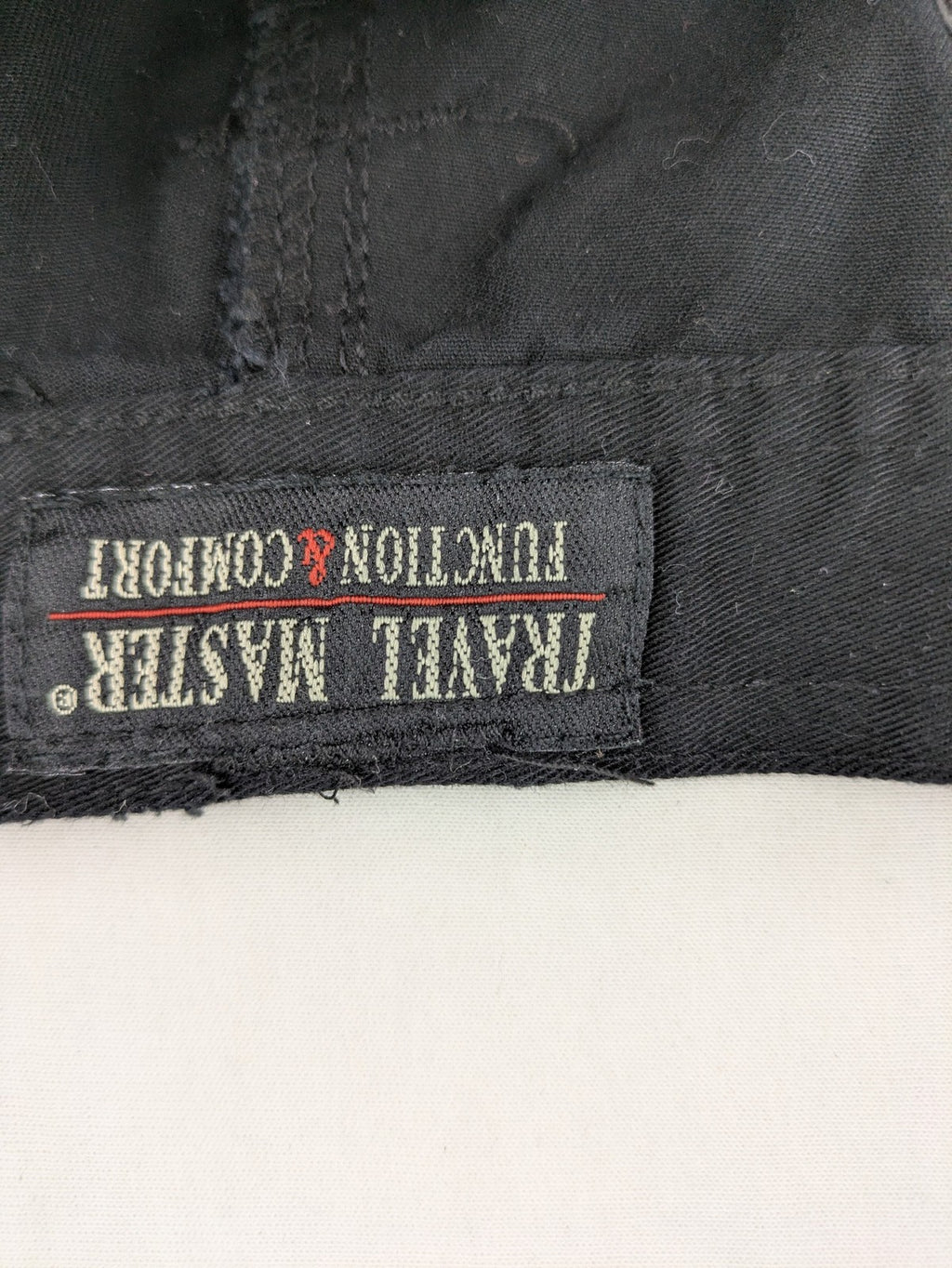 Travel Master black hunting and tactical pants, zip-off design, 100% cotton, multiple pockets.