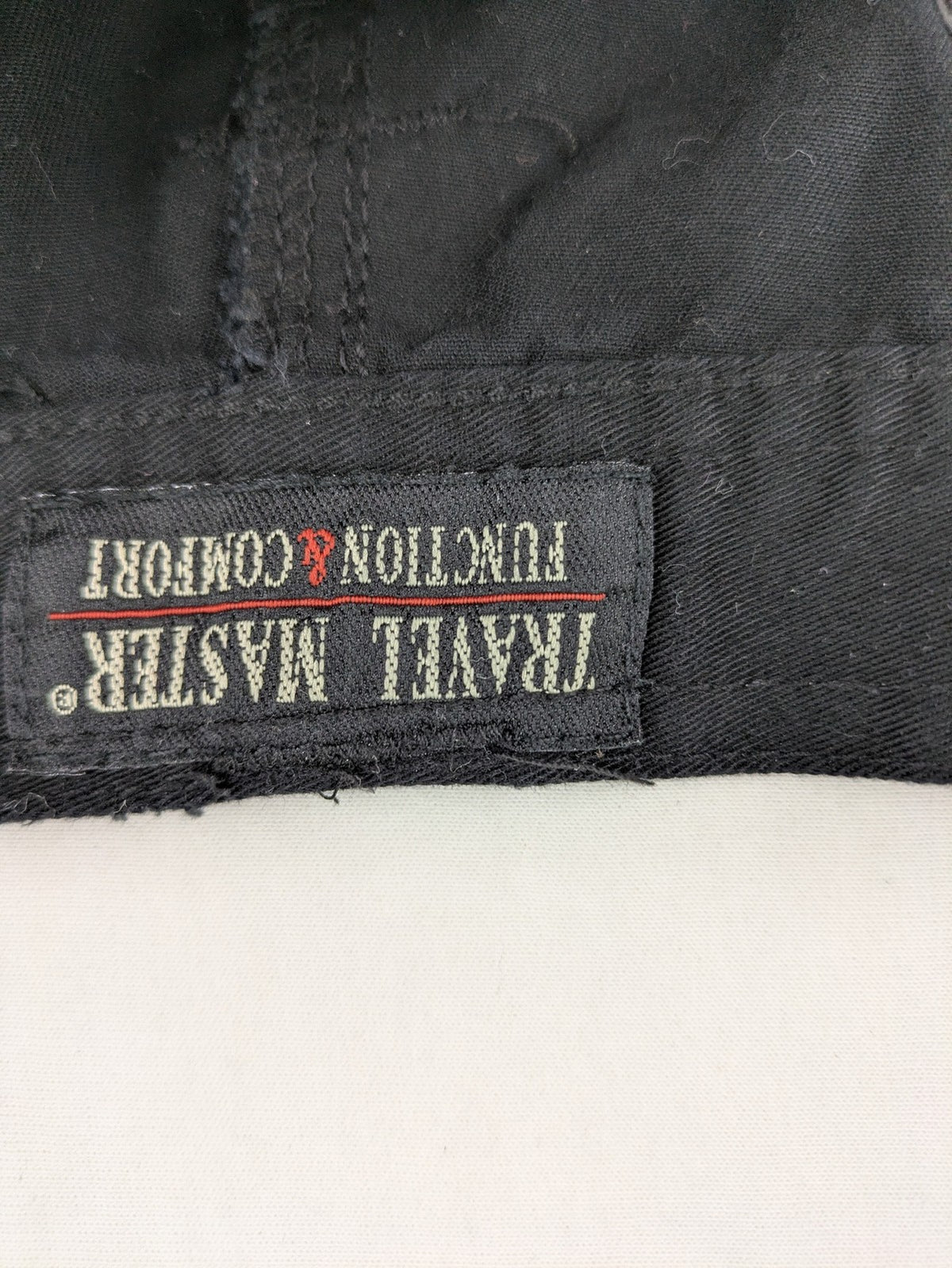 Travel Master black hunting and tactical pants, zip-off design, 100% cotton, multiple pockets.