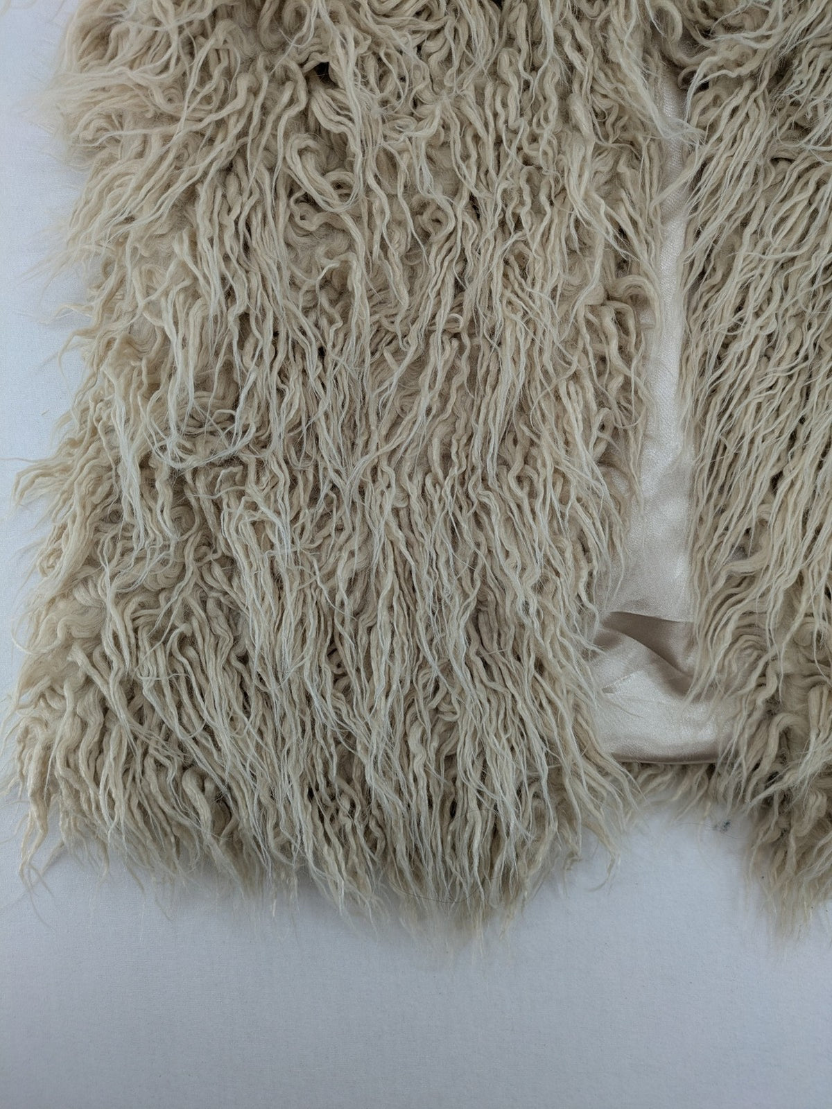 Amisu beige shaggy vest, sleeveless, soft faux fur, open front design.