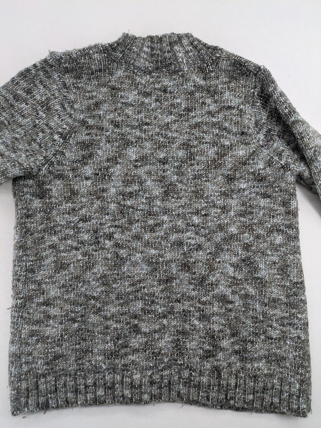 Kenar turtle neck jumper black grey white melange wool blend open knit design