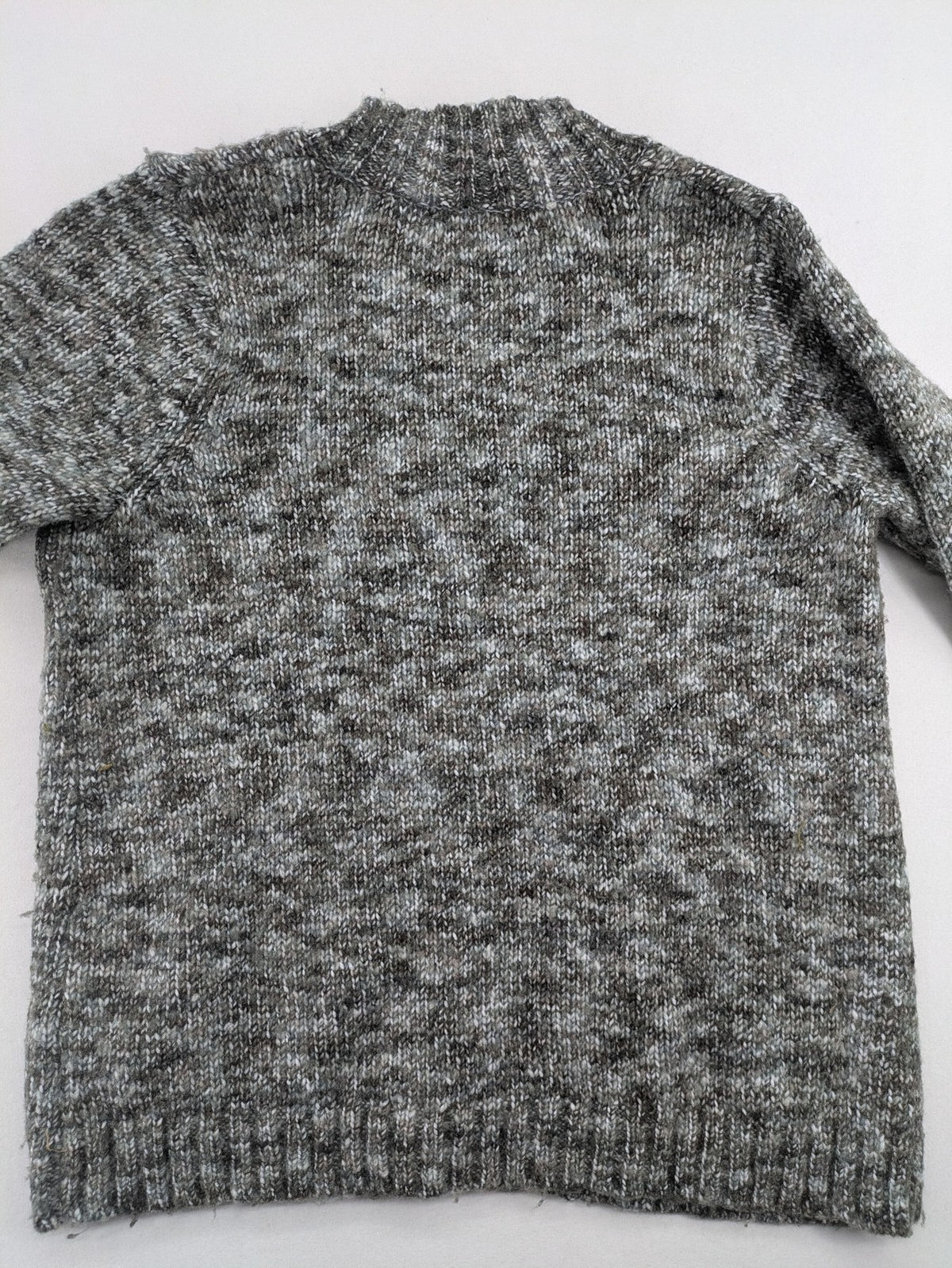 Kenar turtle neck jumper black grey white melange wool blend open knit design