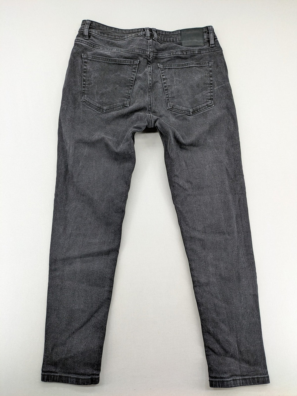Zara black straight jeans faded wash five-pocket design with zipper closure.