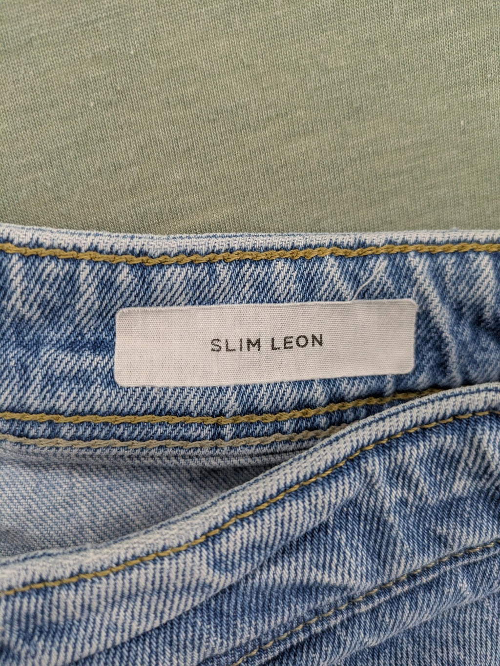 Selected Homme blue slim fit jeans with classic wash and stretch cotton material.