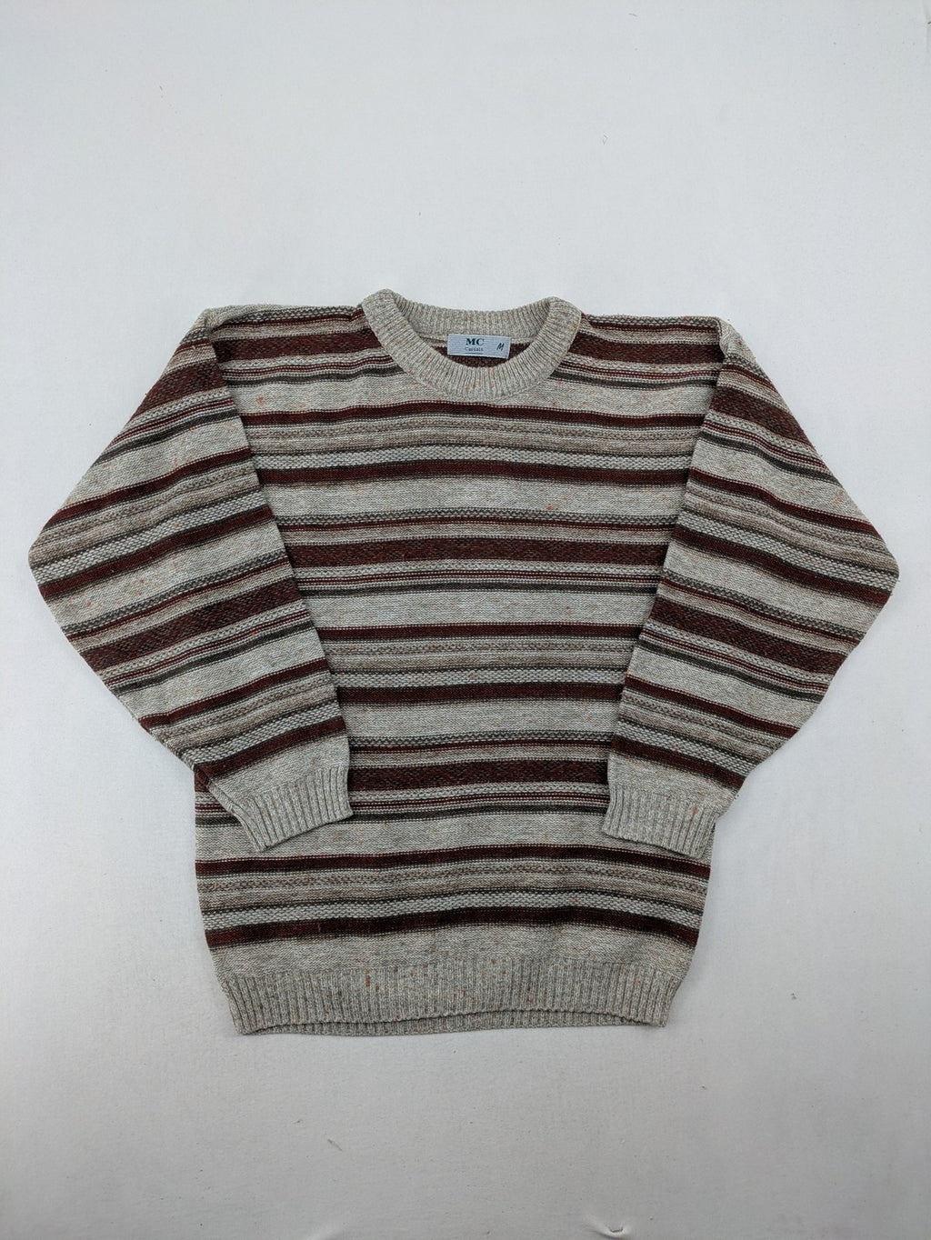 MC Casuals multi turtle neck jumper vintage striped pattern in brown and grey acrylic.