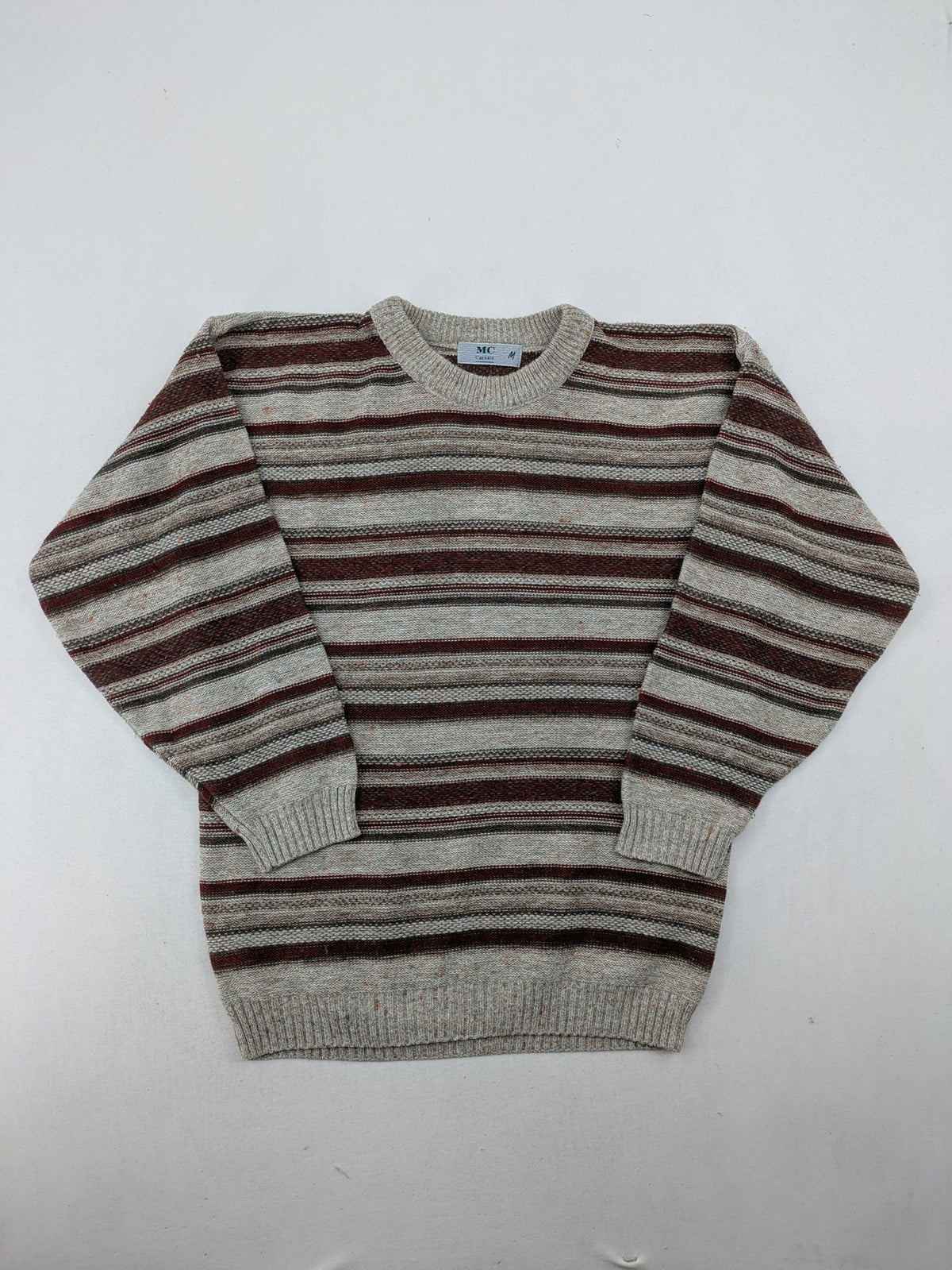 MC Casuals multi turtle neck jumper vintage striped pattern in brown and grey acrylic.