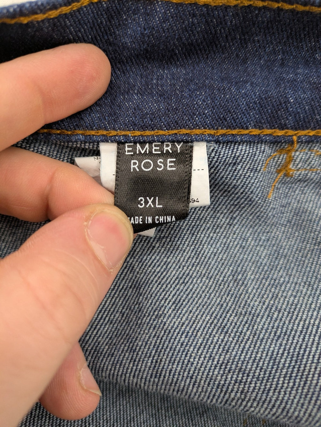 Emery Rose pink culotte pants with wide legs, double button closure, and soft denim blend.