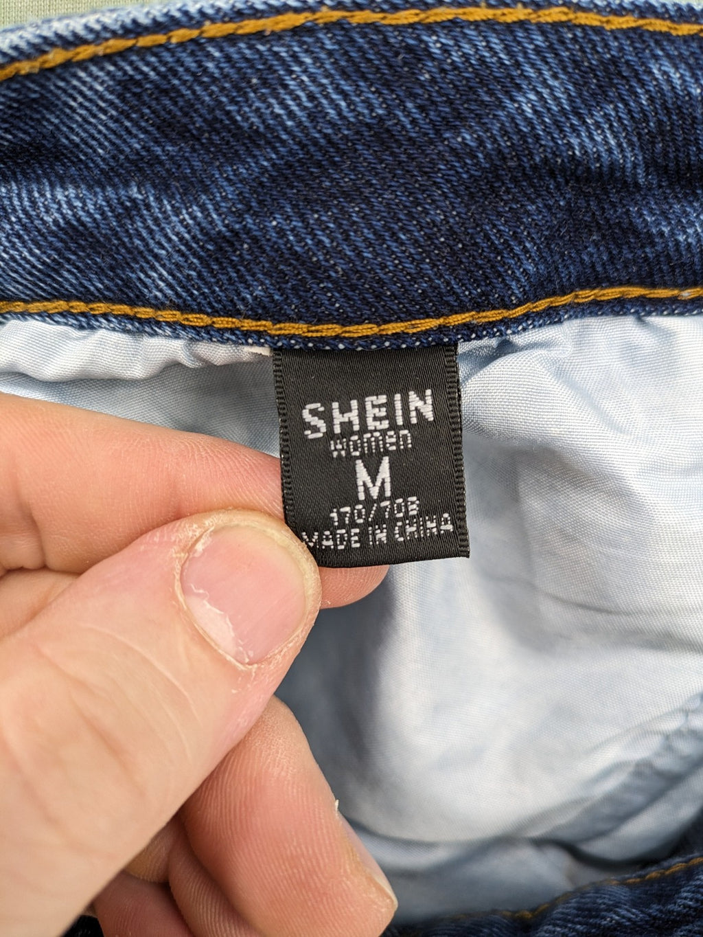 SHEIN blue wide-leg jeans high waist with white smiley face graphics and classic 5-pocket design.