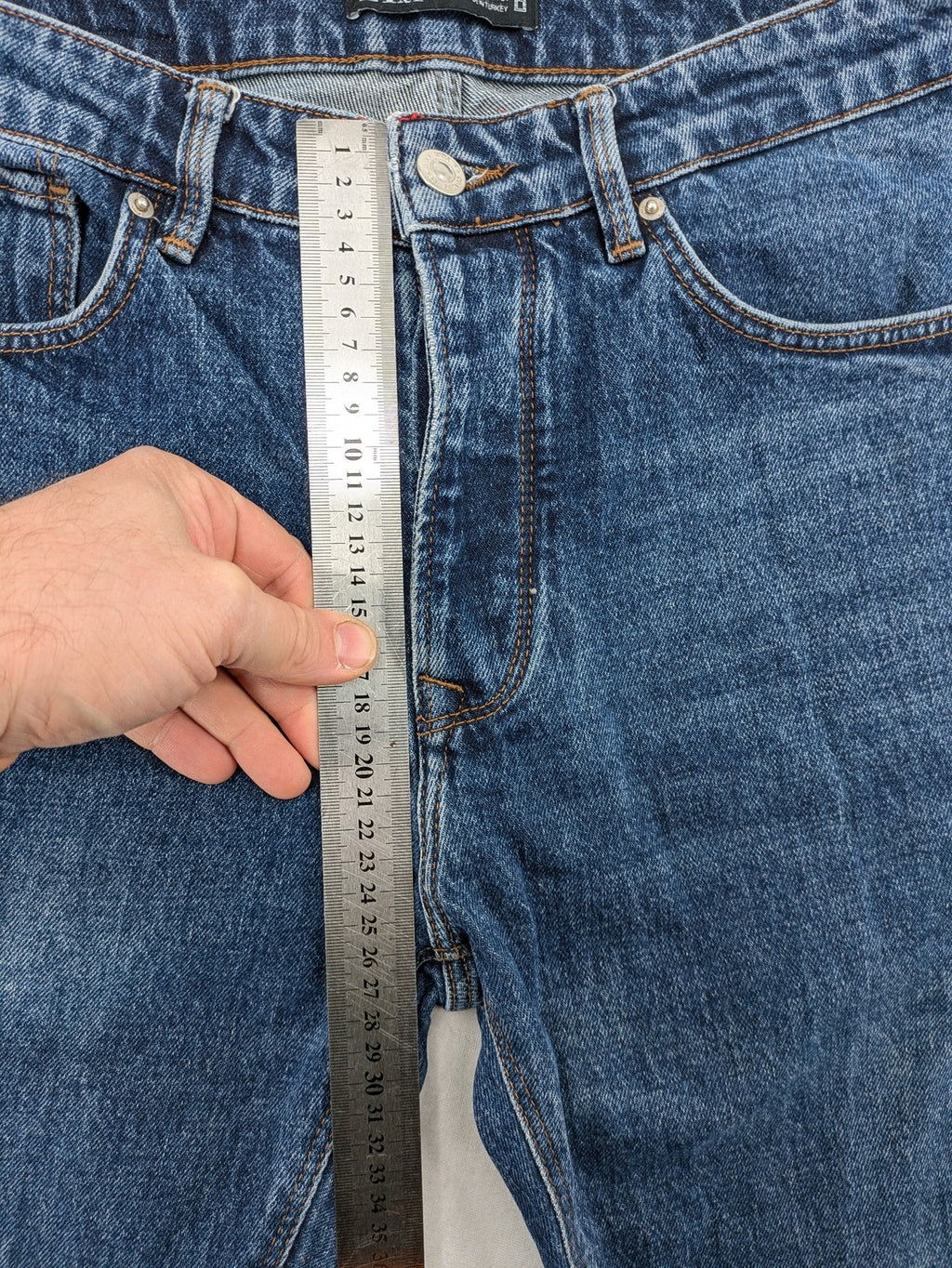 Zara blue straight jeans with classic 5-pocket design and button fly.