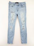Hollister blue high-rise crop super skinny jeans with distressed rips and frayed hem.