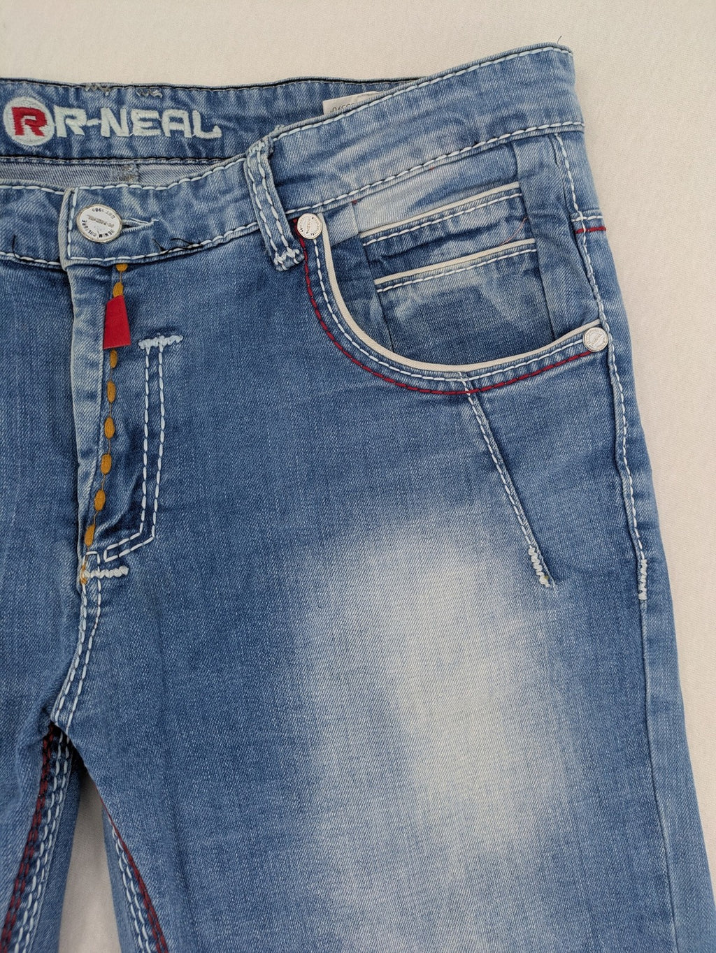 R-Neal blue straight jeans with red-white contrast stitching and classic 5-pocket design.