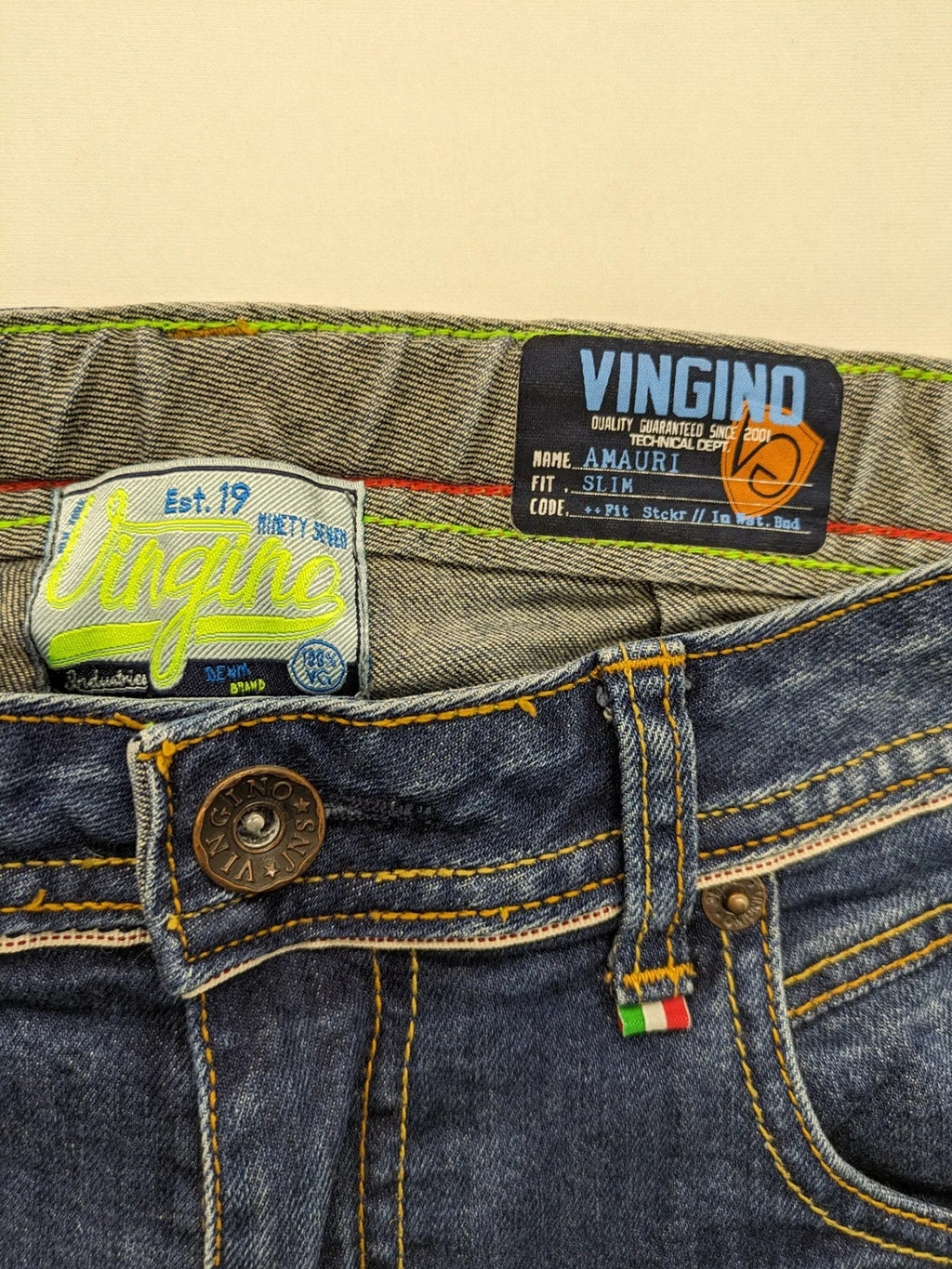 Vingino blue straight jeans medium wash 5-pocket design with zipper fly and stretch denim.