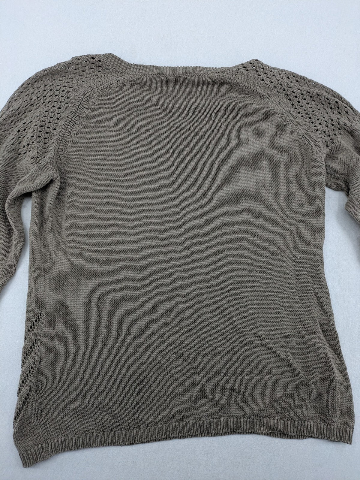Dressin brown knit jumper with decorative open-knit details and comfortable fit.