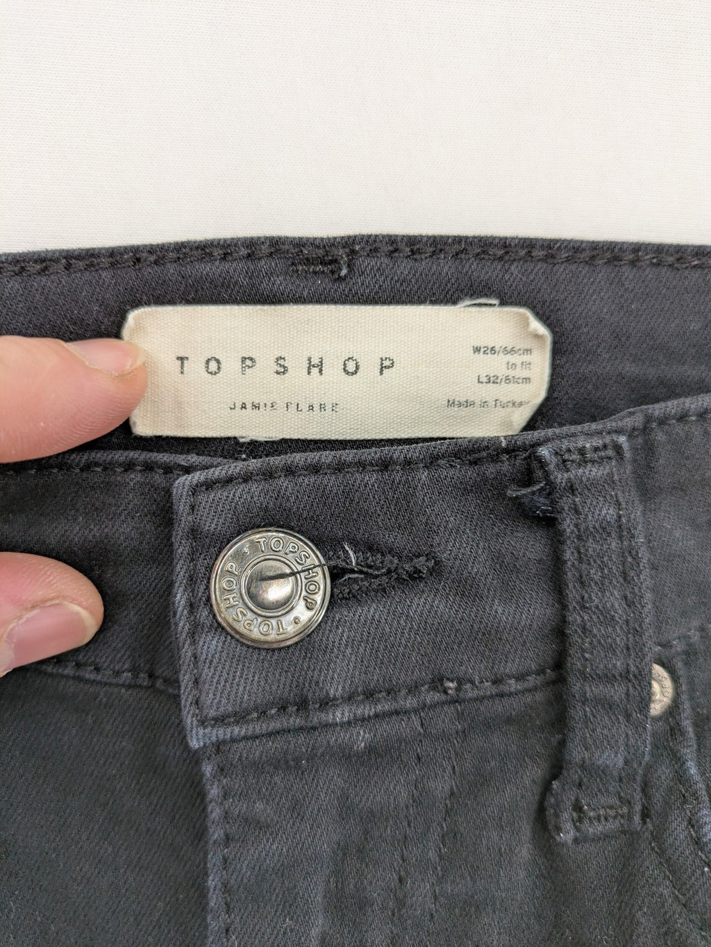 Topshop black Jamie flare jeans high waist stretch denim with classic silhouette.