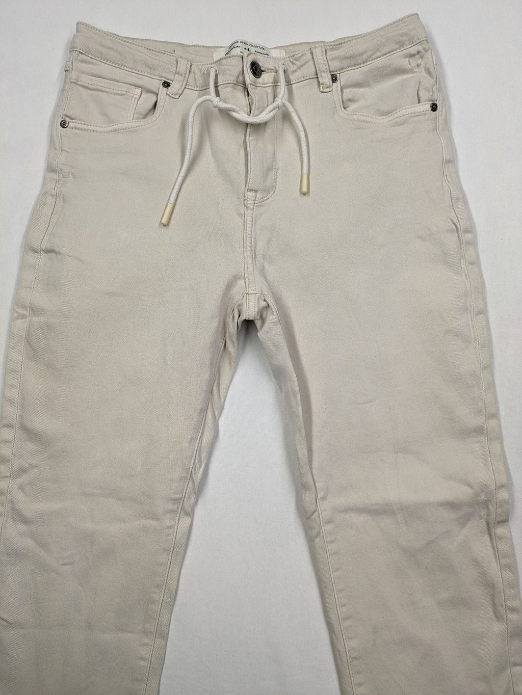 Circle Of Trust beige straight jeans with elastic waistband, drawstring, and classic 5-pocket design.