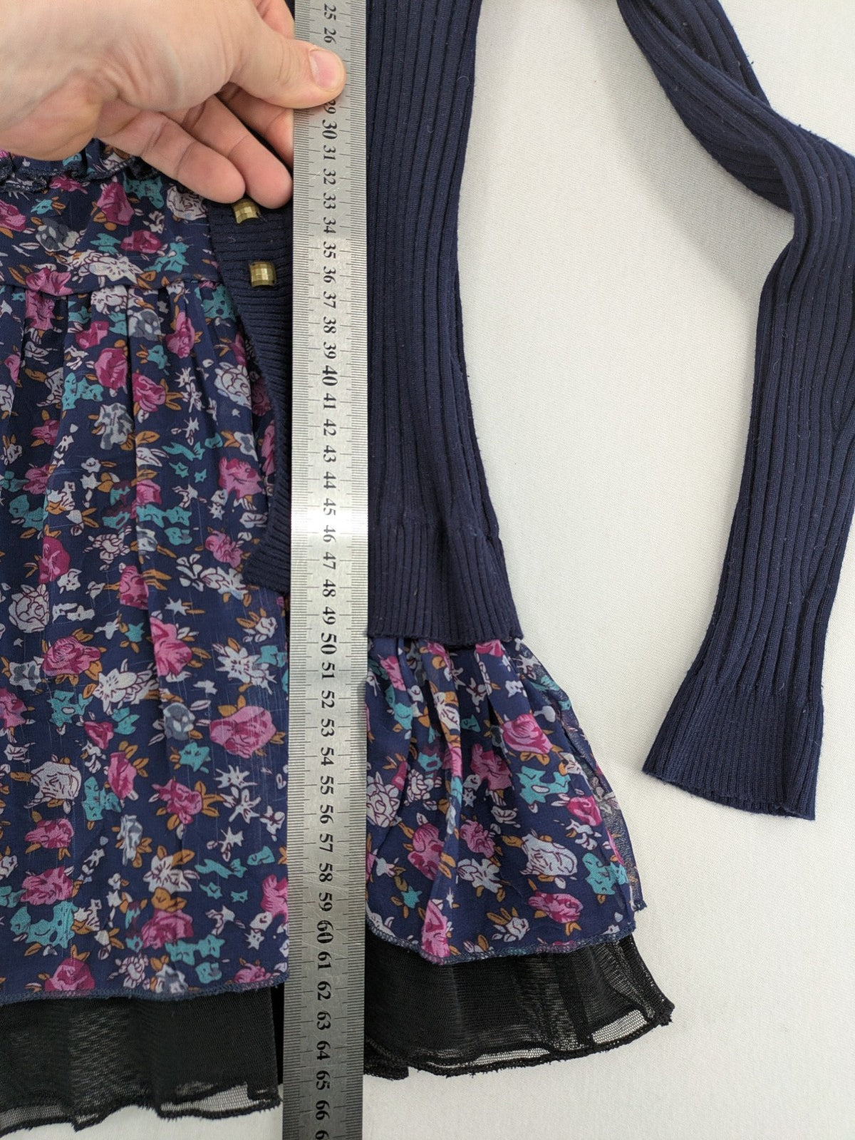 Damen turtle neck jumper dark blue floral ribbed knit with delicate lace hem.