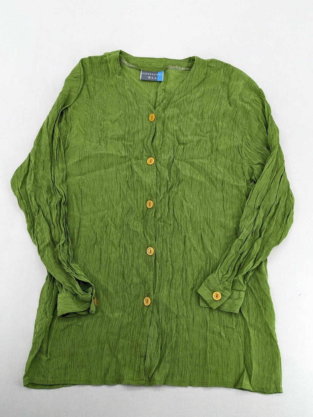 Expressions green blouse with V-neck, button front, and crinkle texture.