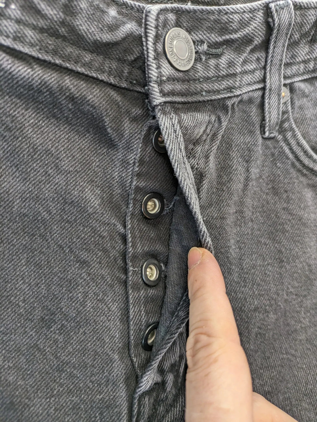 Jack & Jones grey loose fit jeans with classic button fly and 5-pocket design.