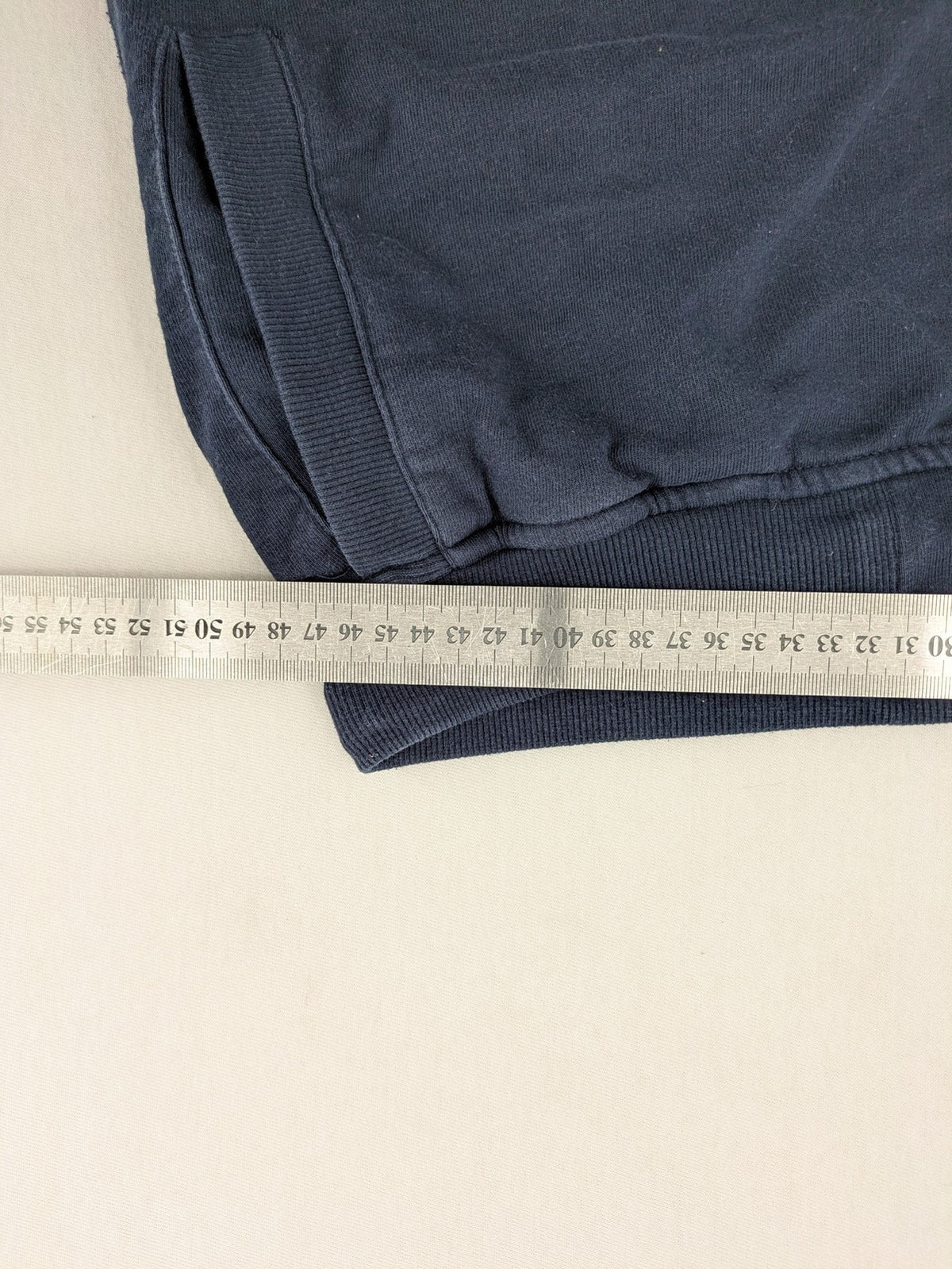 Livergy blue sweatshorts with "Northeast Sailors" graphic print and elastic waistband.