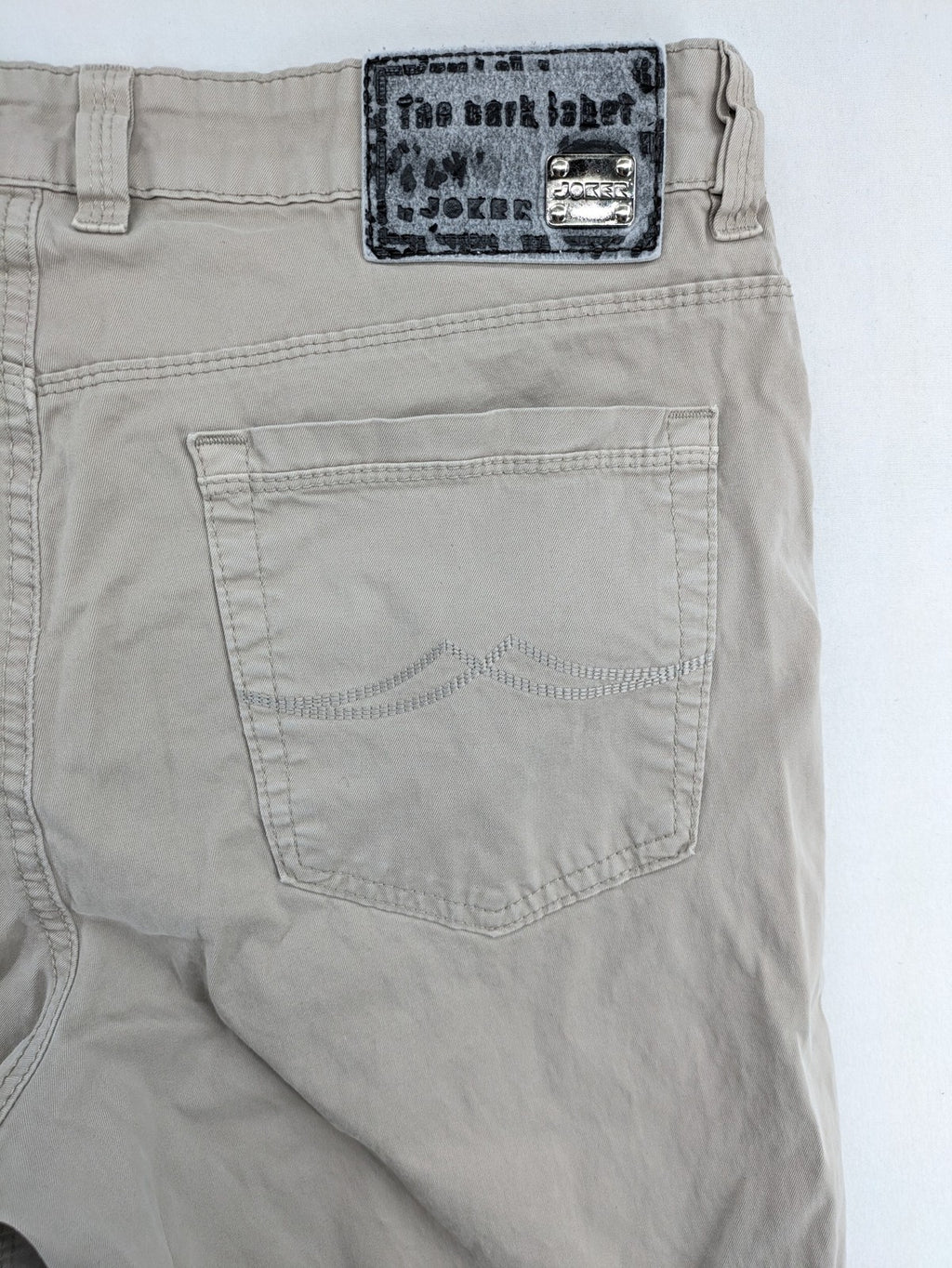 Joker beige chino pants 5-pocket design made from cotton stretch blend.