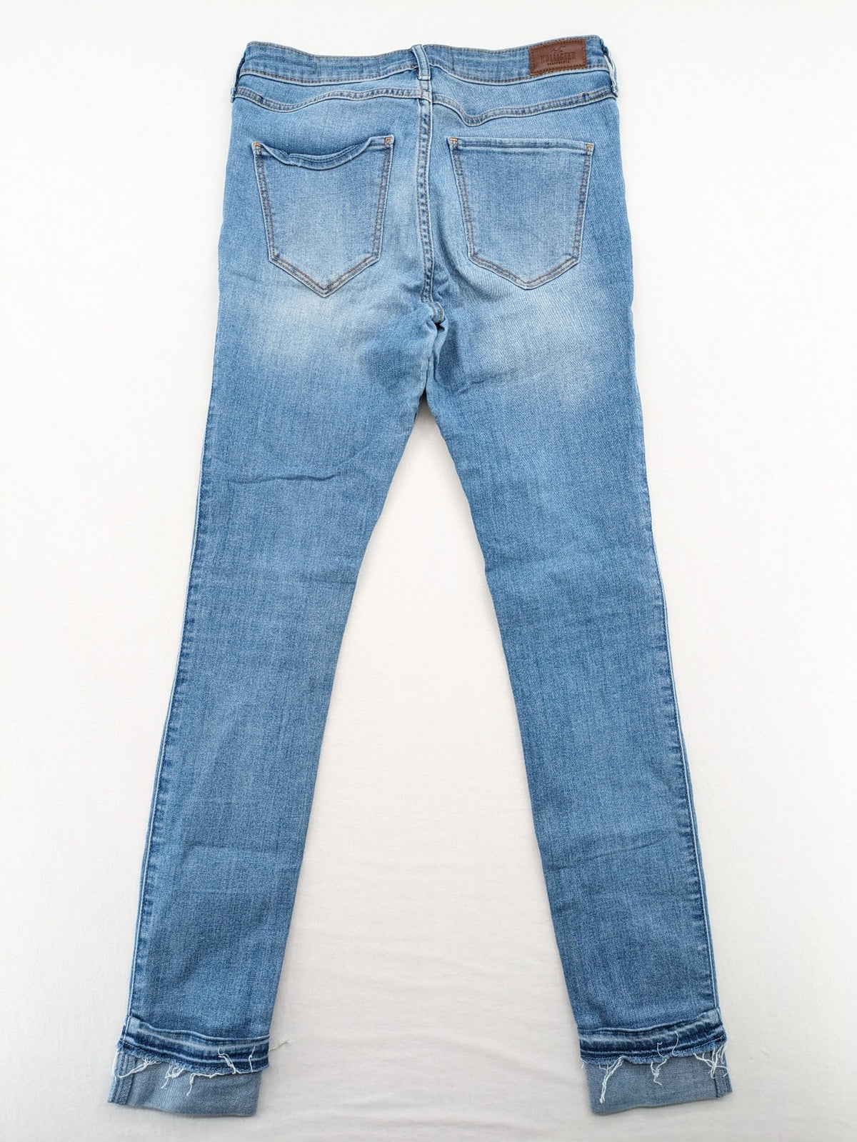 Hollister blue high rise super skinny jeans with frayed hem and classic stretch denim.