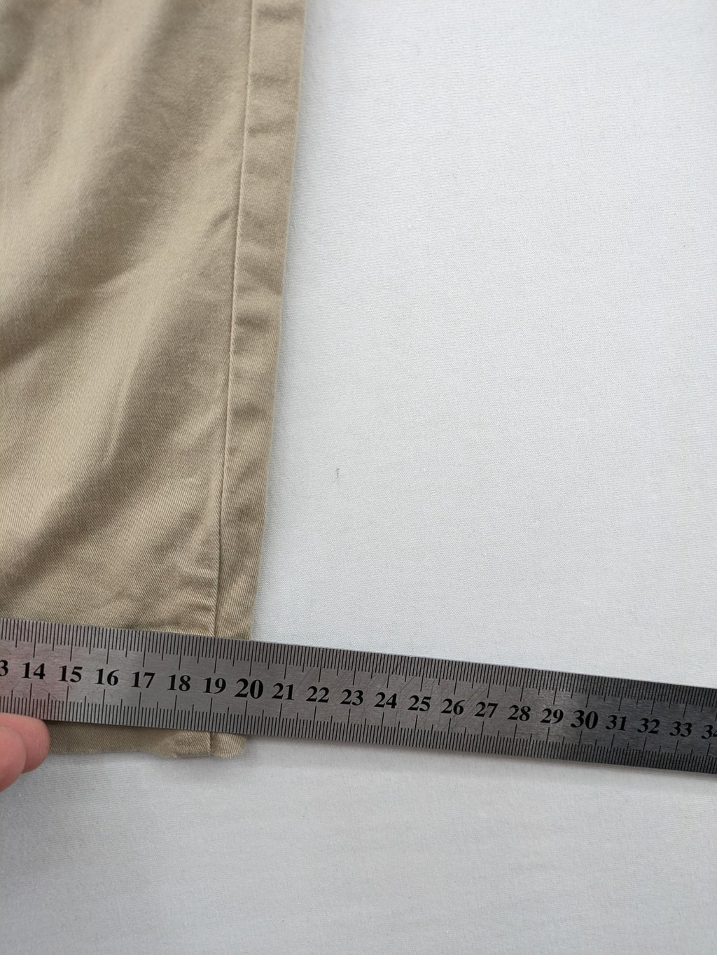 Gap beige girlfriend chino pants with relaxed fit and soft cotton-stretch blend.