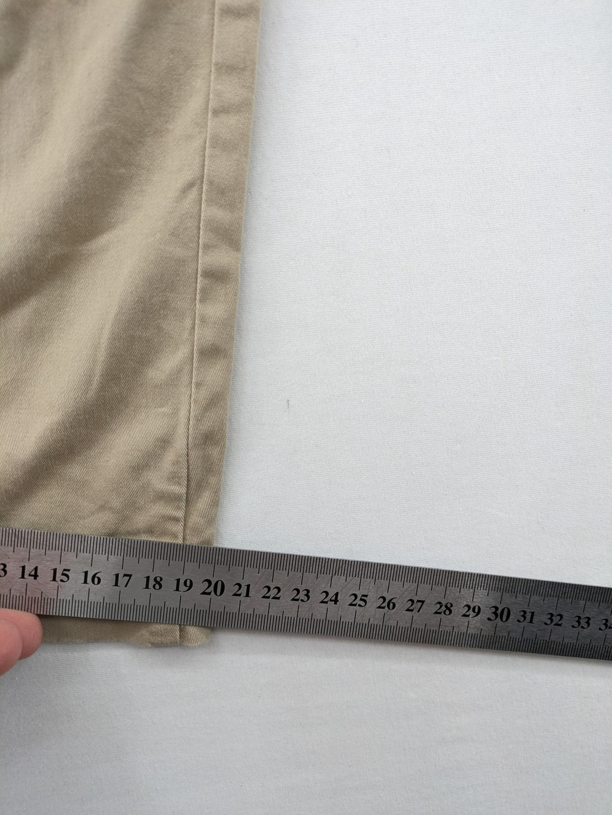 Gap beige girlfriend chino pants with relaxed fit and soft cotton-stretch blend.