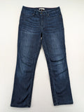 Tommy Hilfiger blue straight jeans with iconic logo and dark wash denim finish.