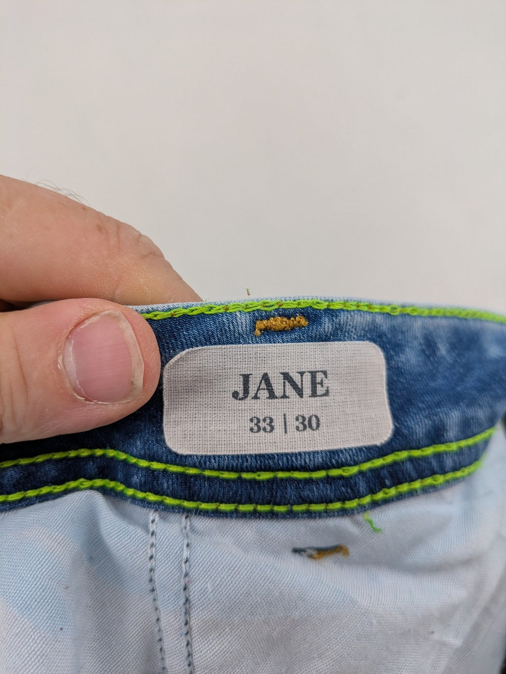 Street One blue straight jeans with green patterned cuffs and button fly detail.